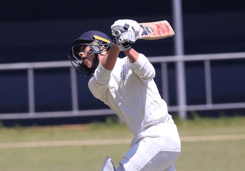 Cricket player giving two thumbs up