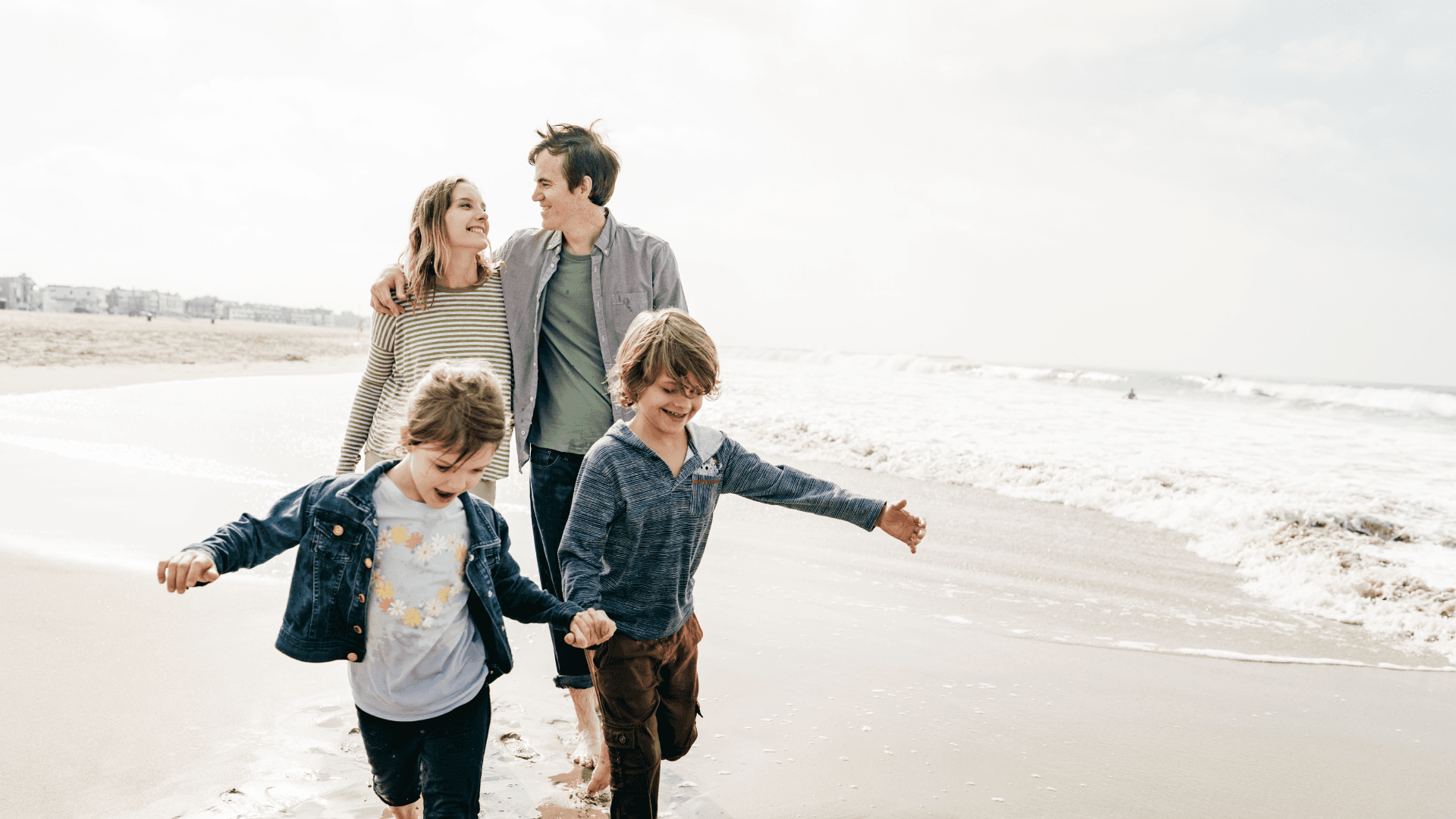 man wearing gray polo shirt beside dry-erase board