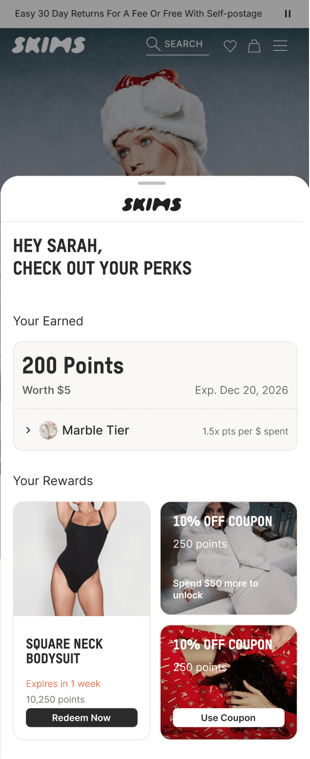 mobile UI showing the loyalty widget with a clothing store branding applied
