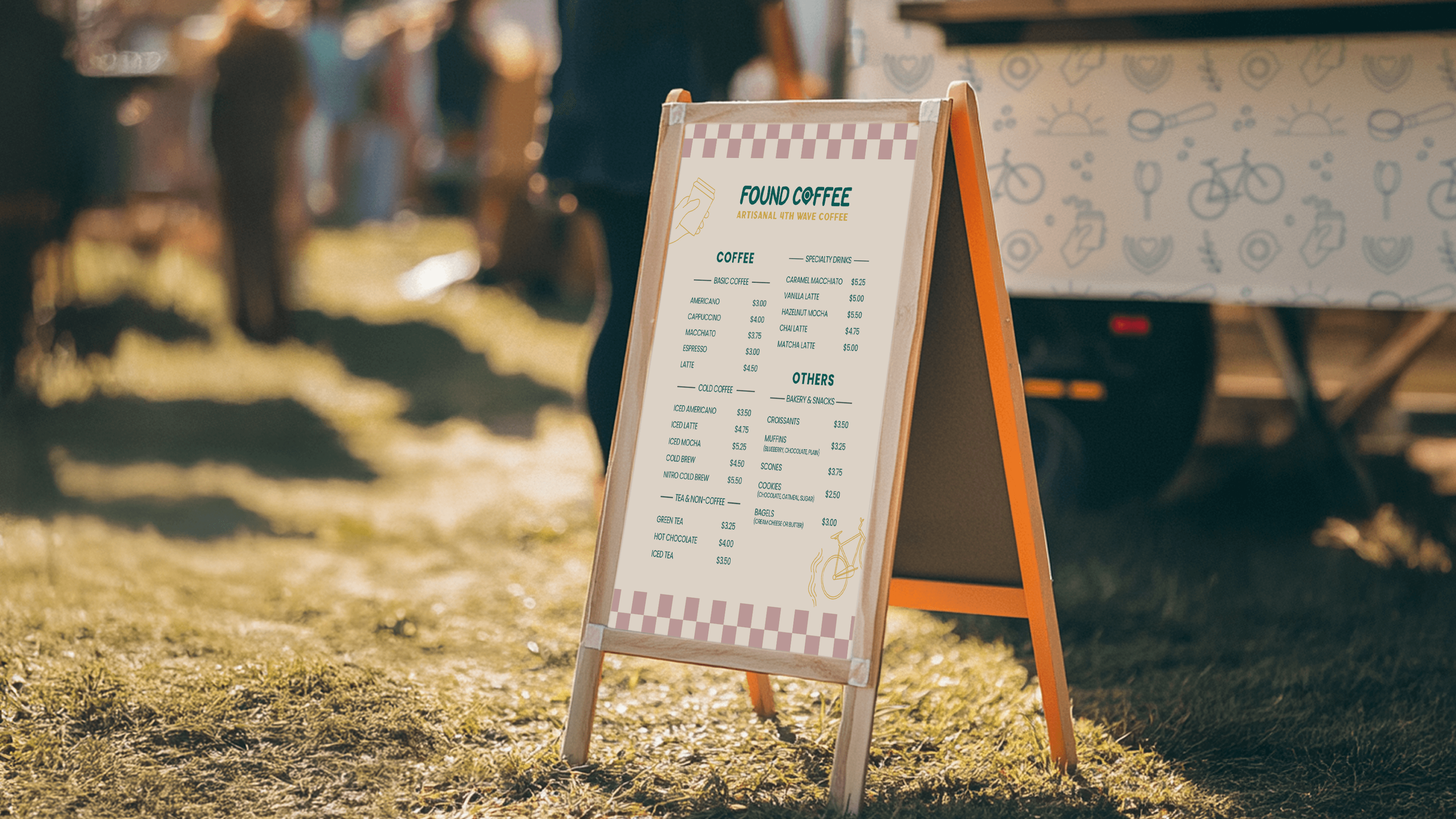 sandwich board menu outside on grass