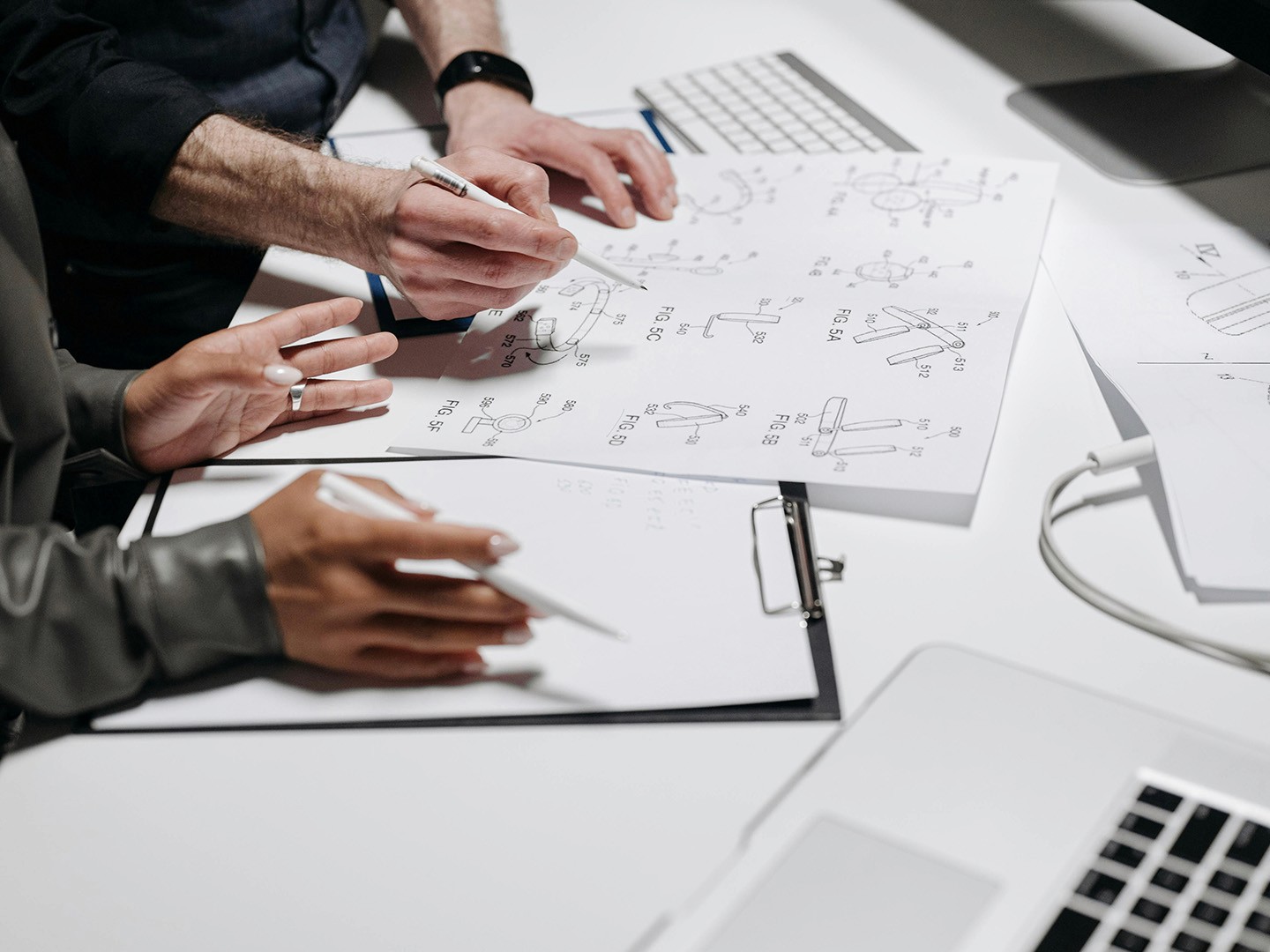 Team client discussion during product design meeting