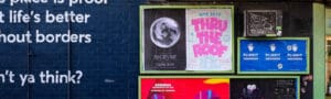 a wall with posters on it