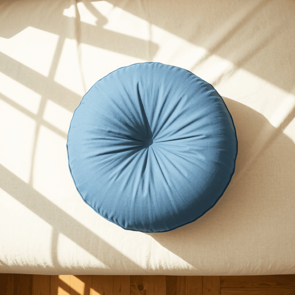product photography of a cylindrical cushion for support or decoration
