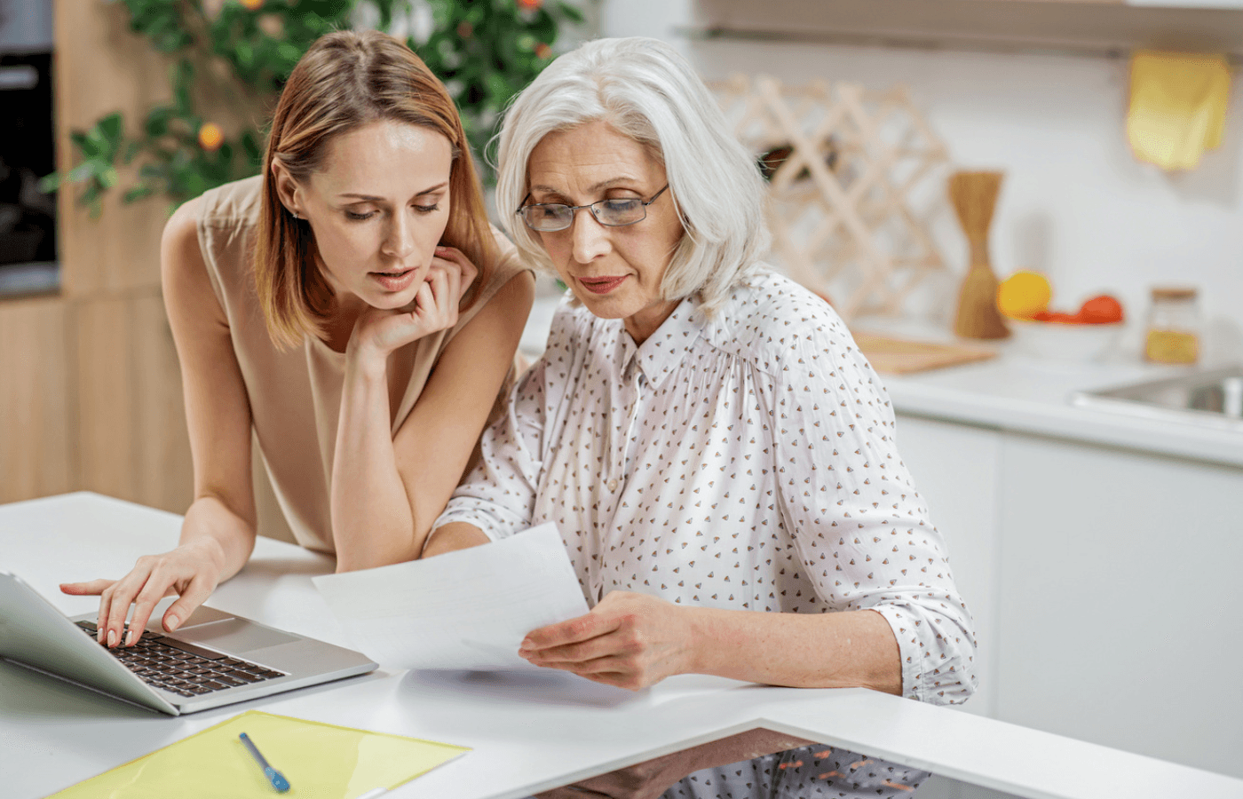 daughter helping her mother with finances