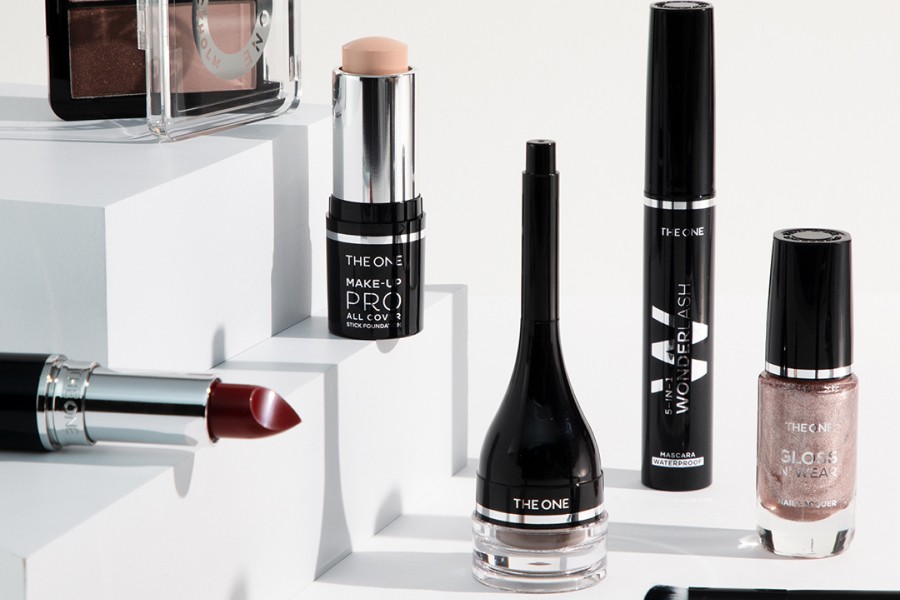 a woman holding an apple