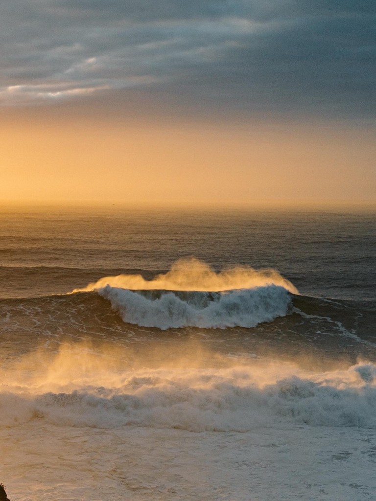 Atlantic ocean waves at sunset near Villa Flora