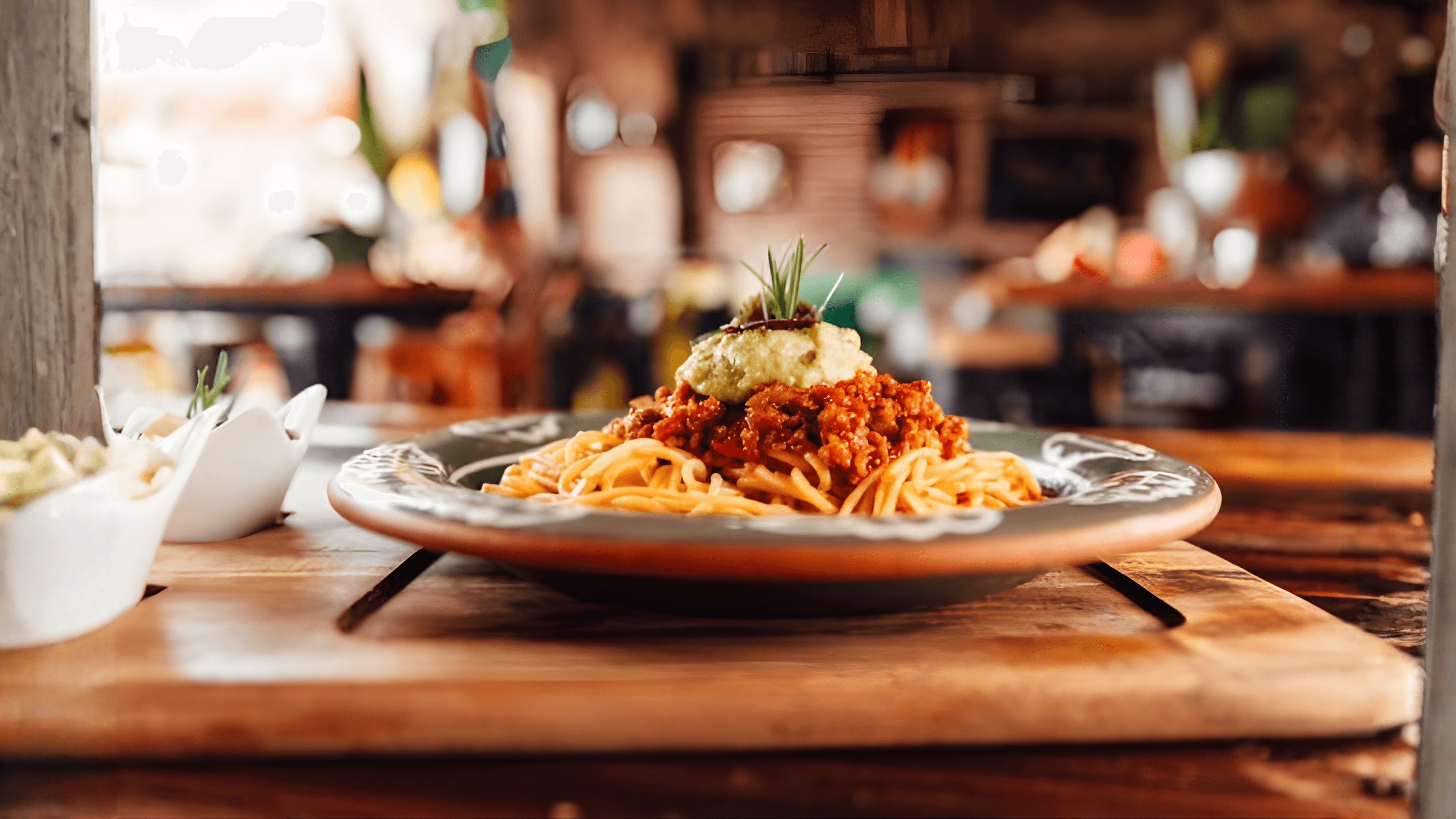 Spaghetti Bolognese from PASTA 9 Toronto, handcrafted pasta in rich tomato-meat sauce, served warm in a cozy Italian-inspired setting.