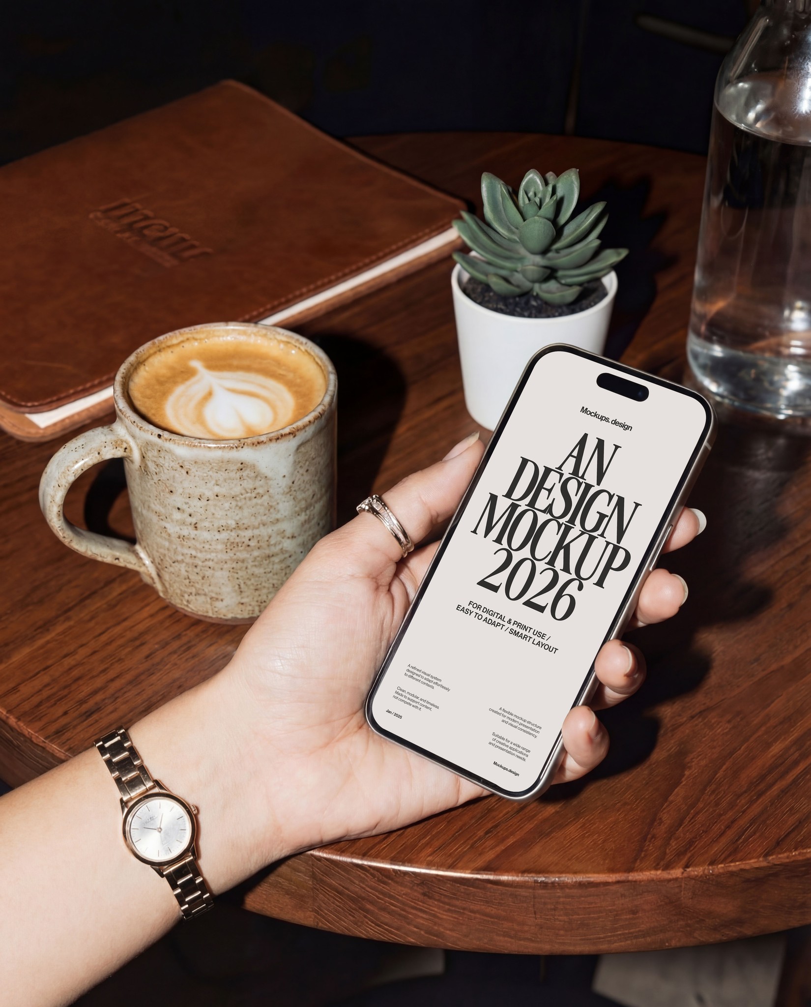 Realistic hand holding iPhone mockup at restaurant table