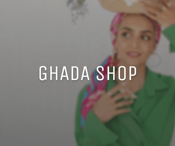 Hero section of Ghada Shop fashion e-commerce website featuring a modest fashion model and the tagline “Modest, Feminine, Timeless.”