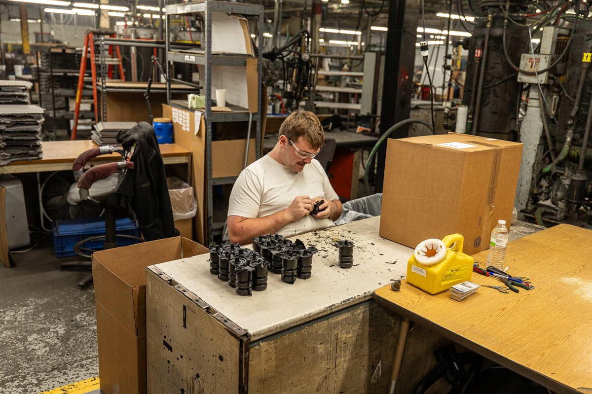 PURforms employee trimming polyurethane part