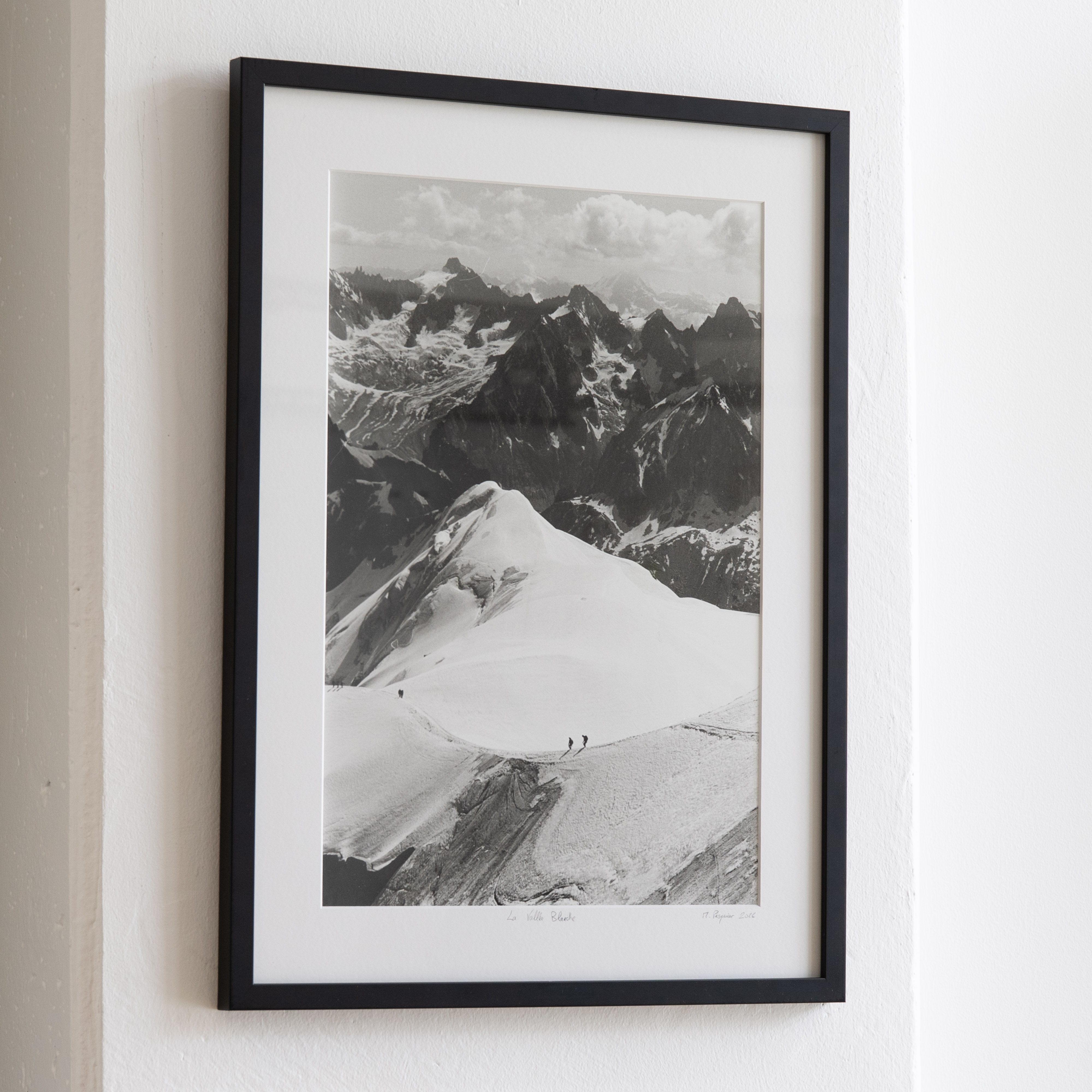Darkroom prints drying on wire racks