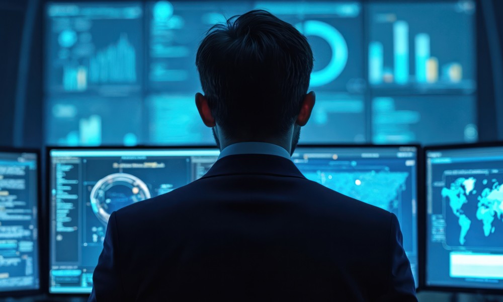 Red digital warning symbol glowing on a circuit board interface, representing active ransomware exploitation of the VMware ESXi CVE 2025 22225 vulnerability and hypervisor compromise.