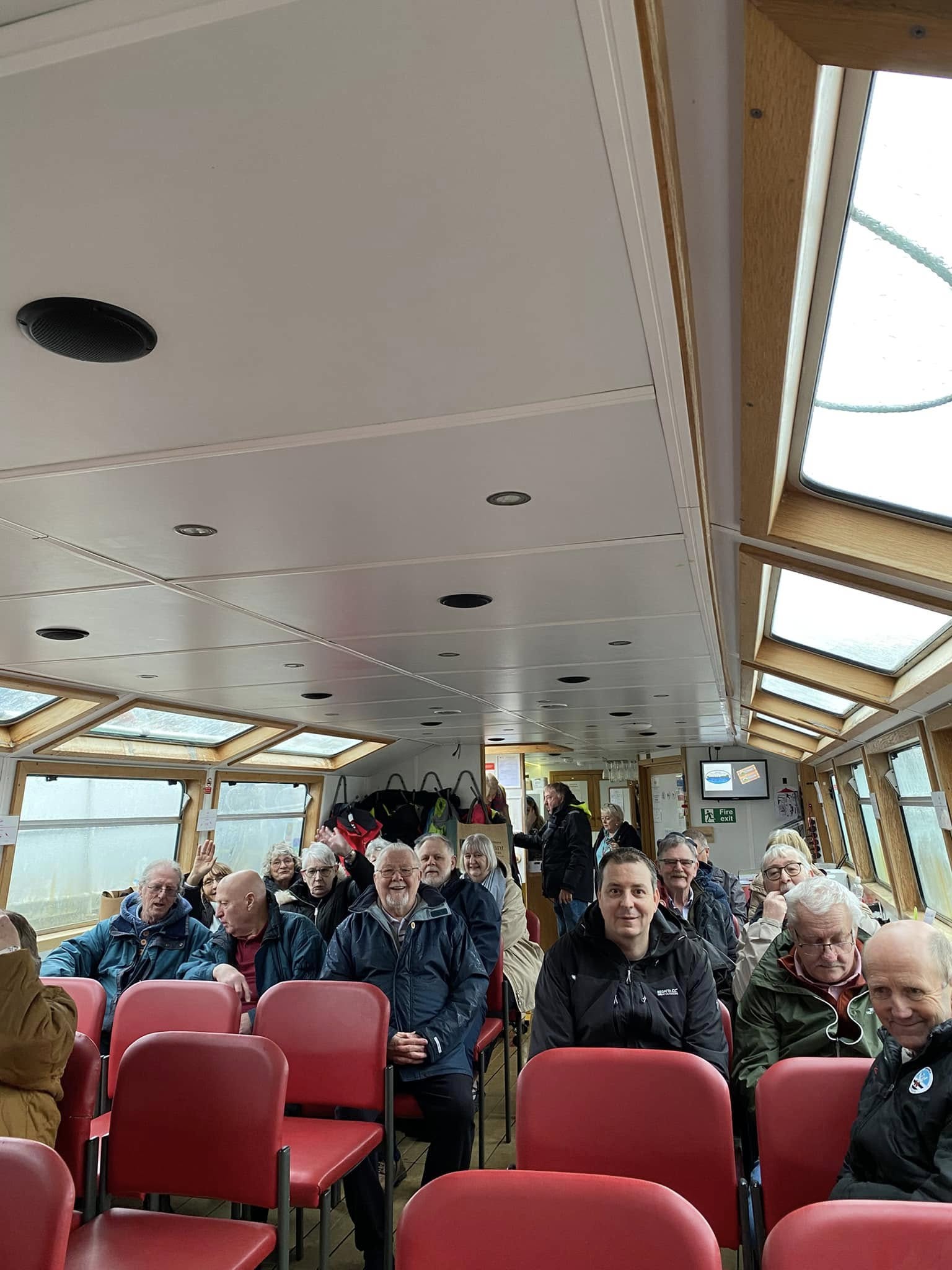 Men working together in the shed