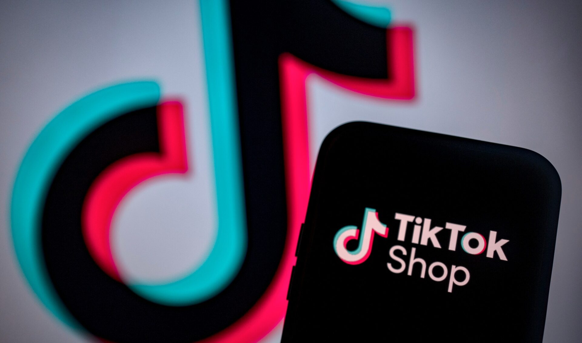Phone showing the TikTok Shop logo
