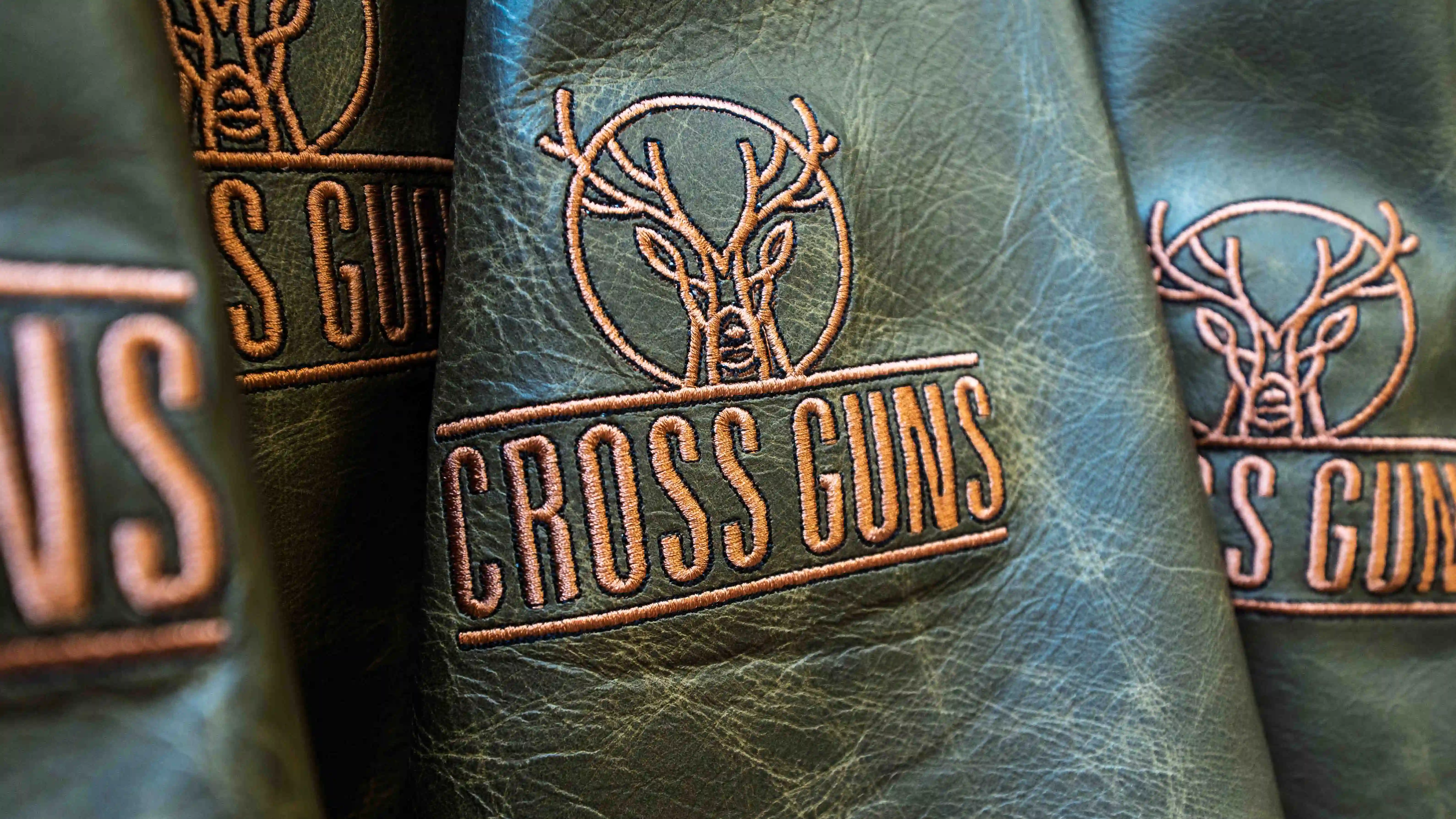 Close up shot of embroidered Cross Guns aprons