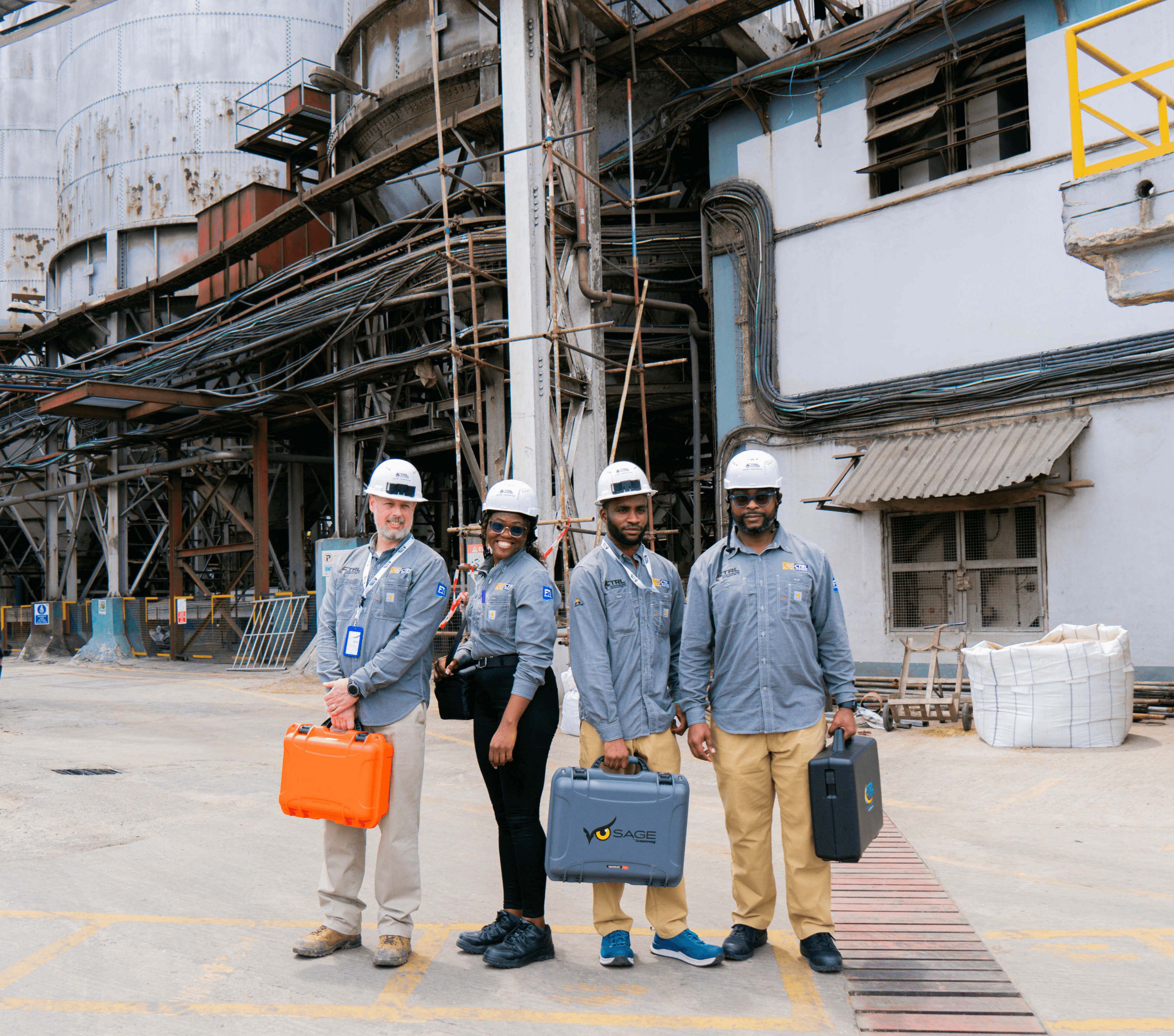 smiling newly wed couple about to kiss in green field