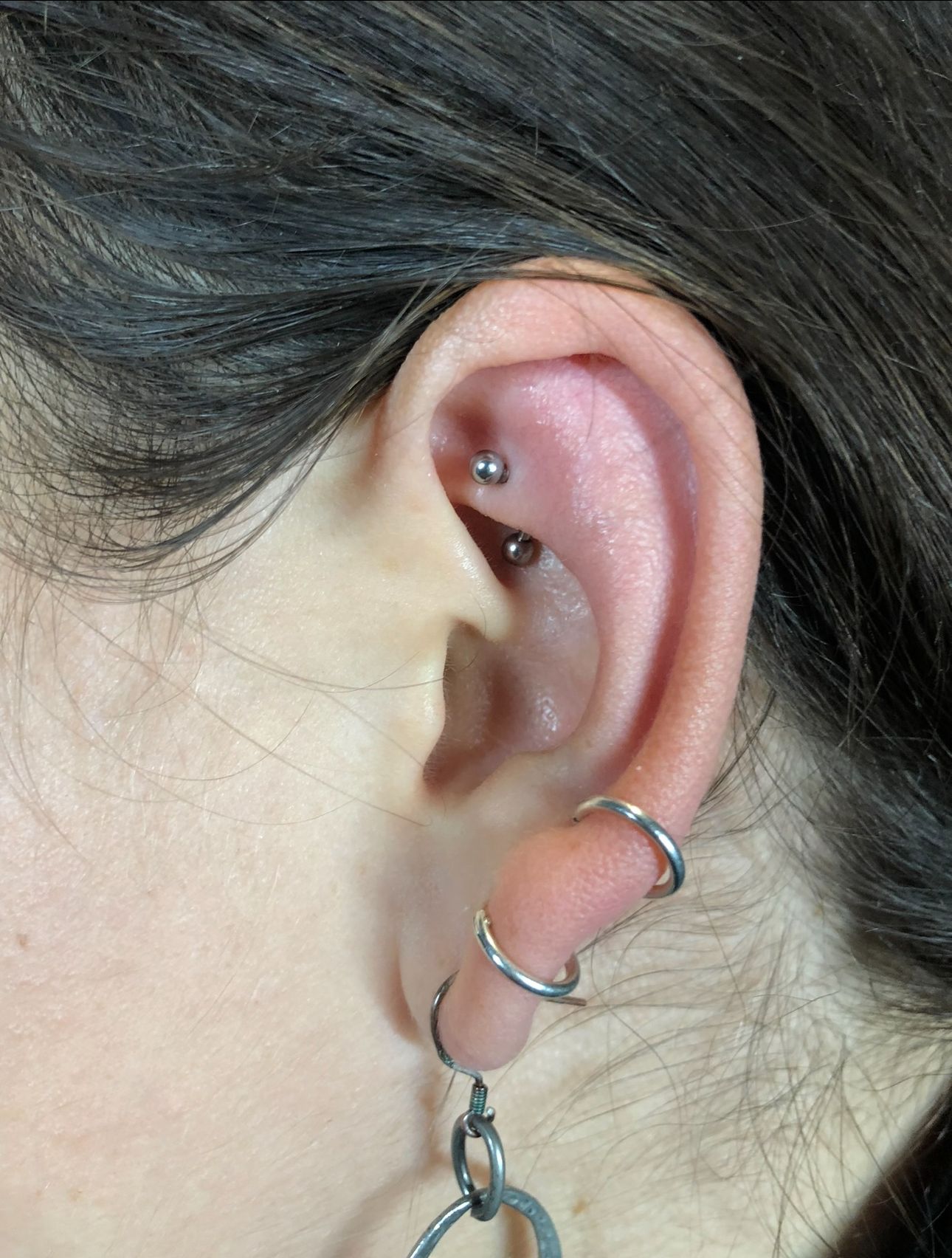 Multiple ear piercings Tattoo Studio Reception Area Prenzlauer Berg