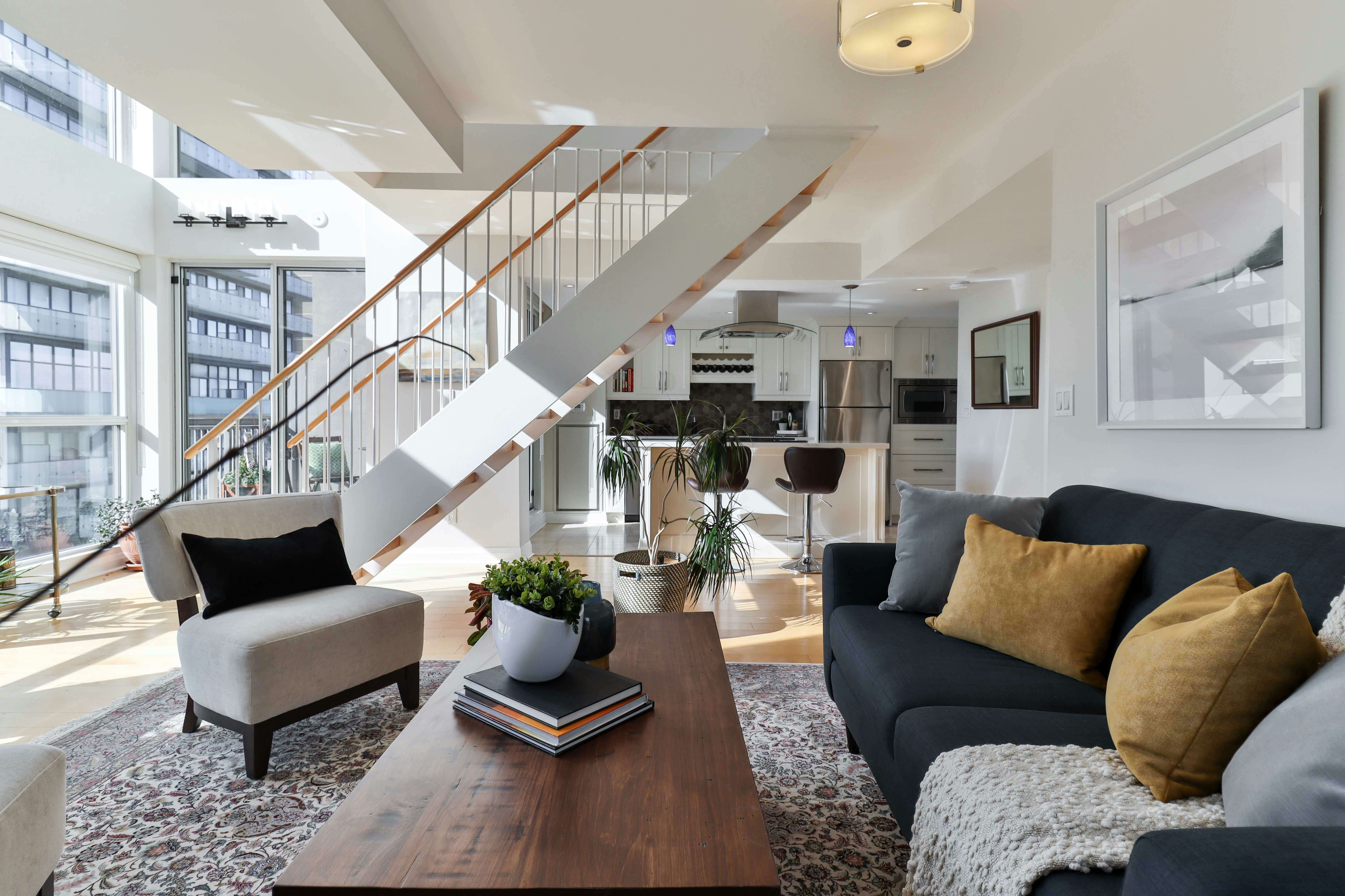 a living room with a staircase