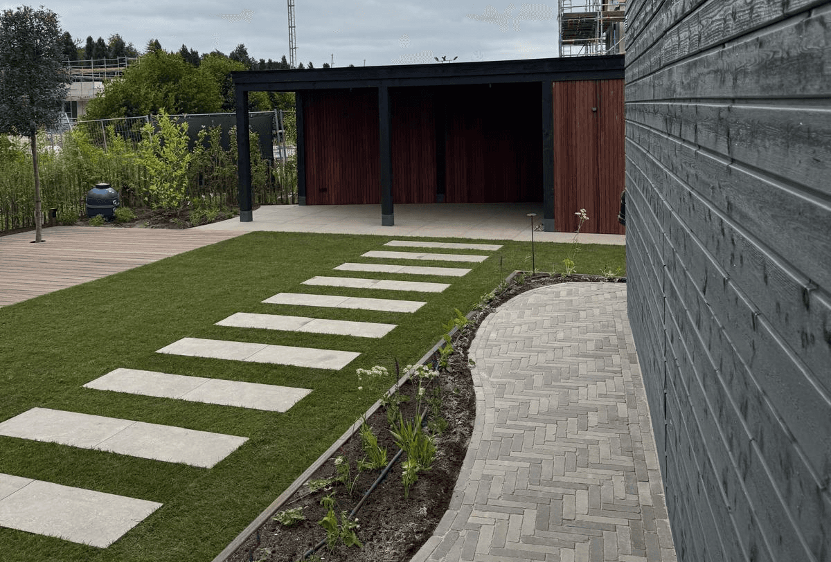 Tuin met overkapping en buitenverblijf - Art gardens