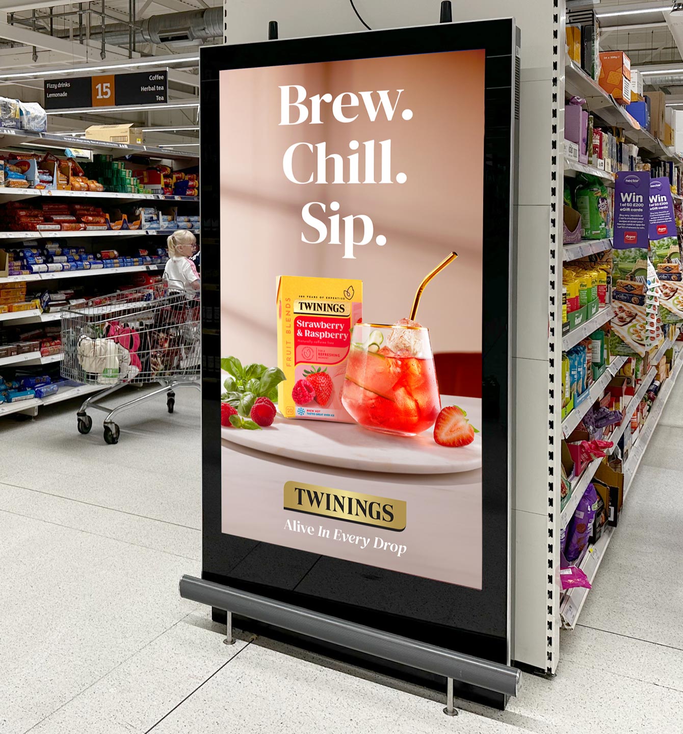 A Poster of a Twinings advert in a supermarket.