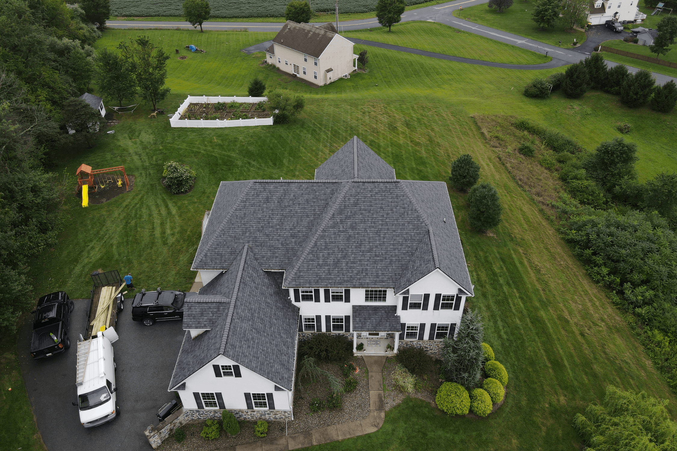 New slate color architectural roof by KCX Roofing in Olathe, Kansas