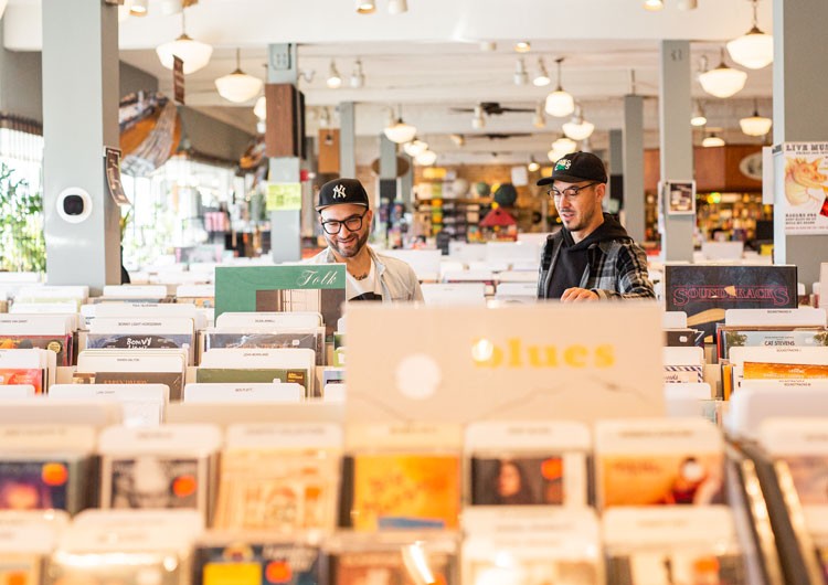 Ryan Truax and Michael Sacca looking at records at Electric Fetus