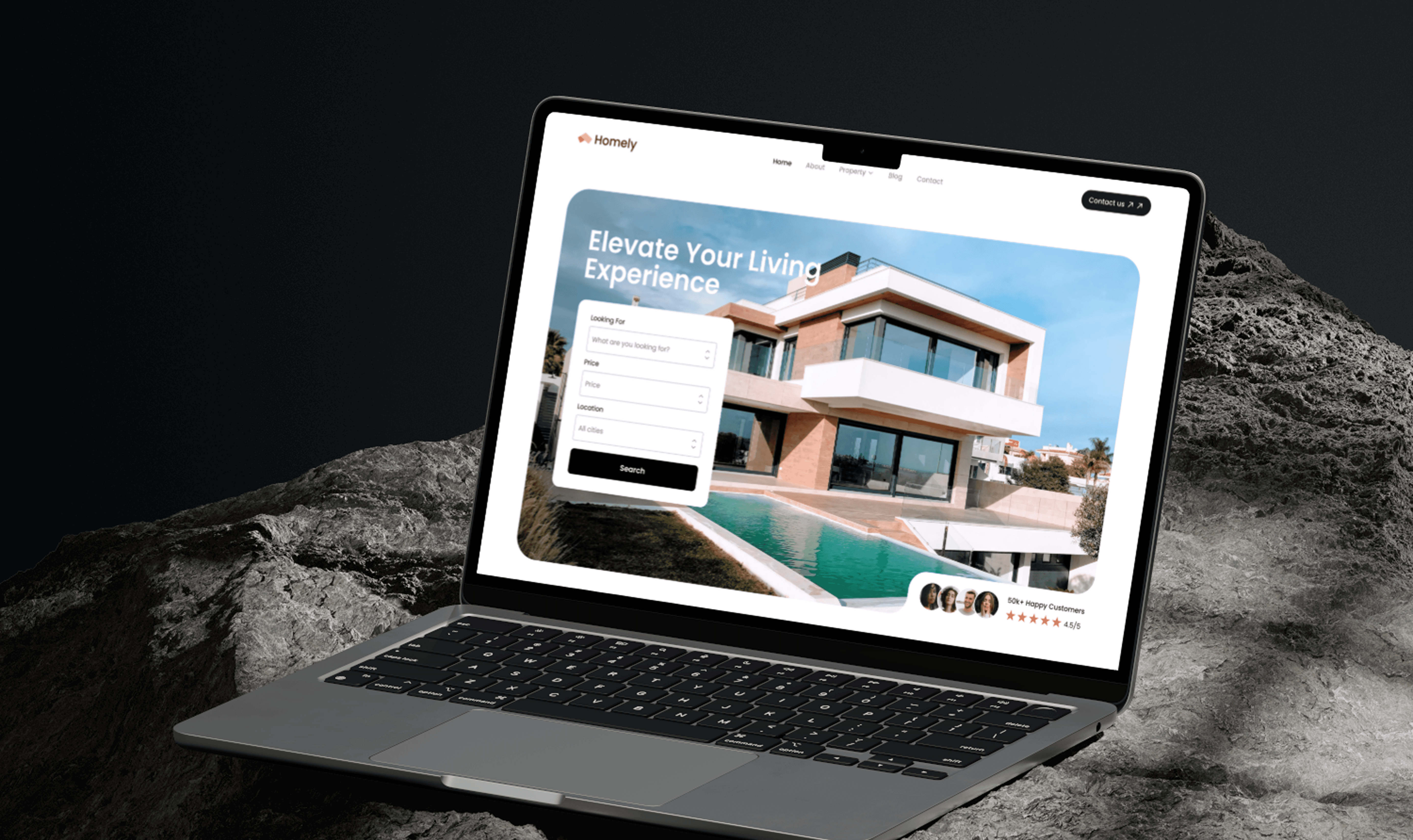 Person working on laptop at a wooden desk.