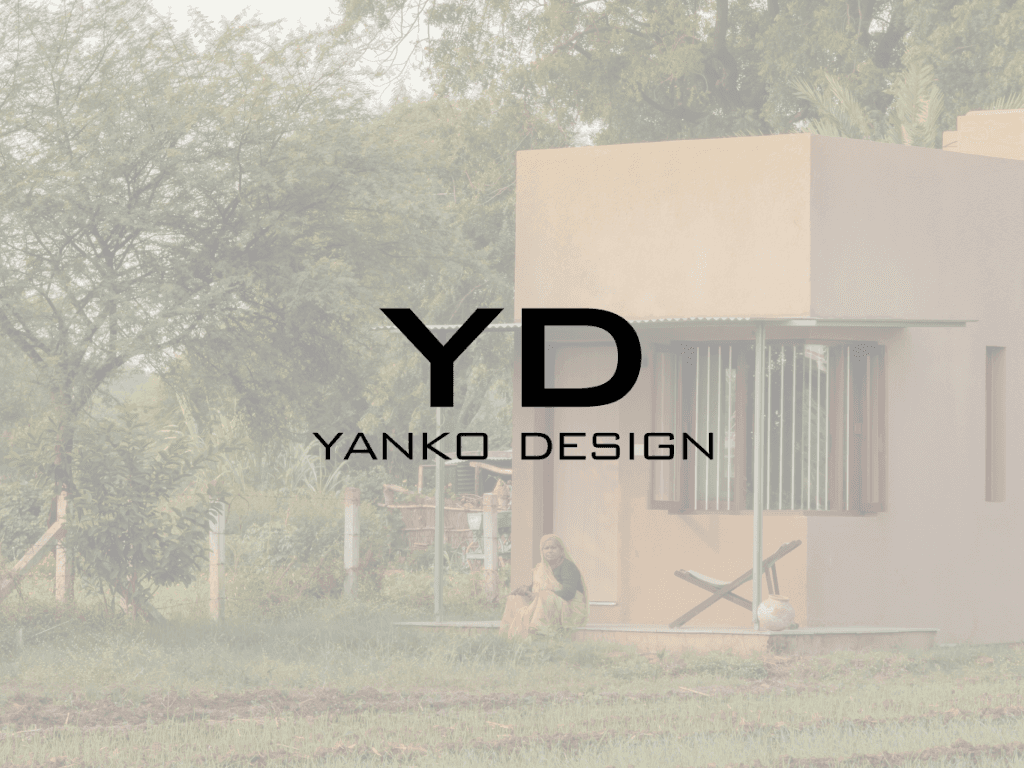 a small orange house with a blue door