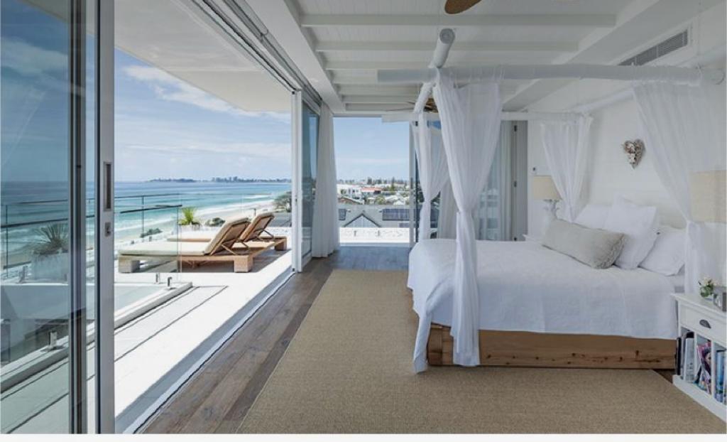 person writing on a piece of paper 