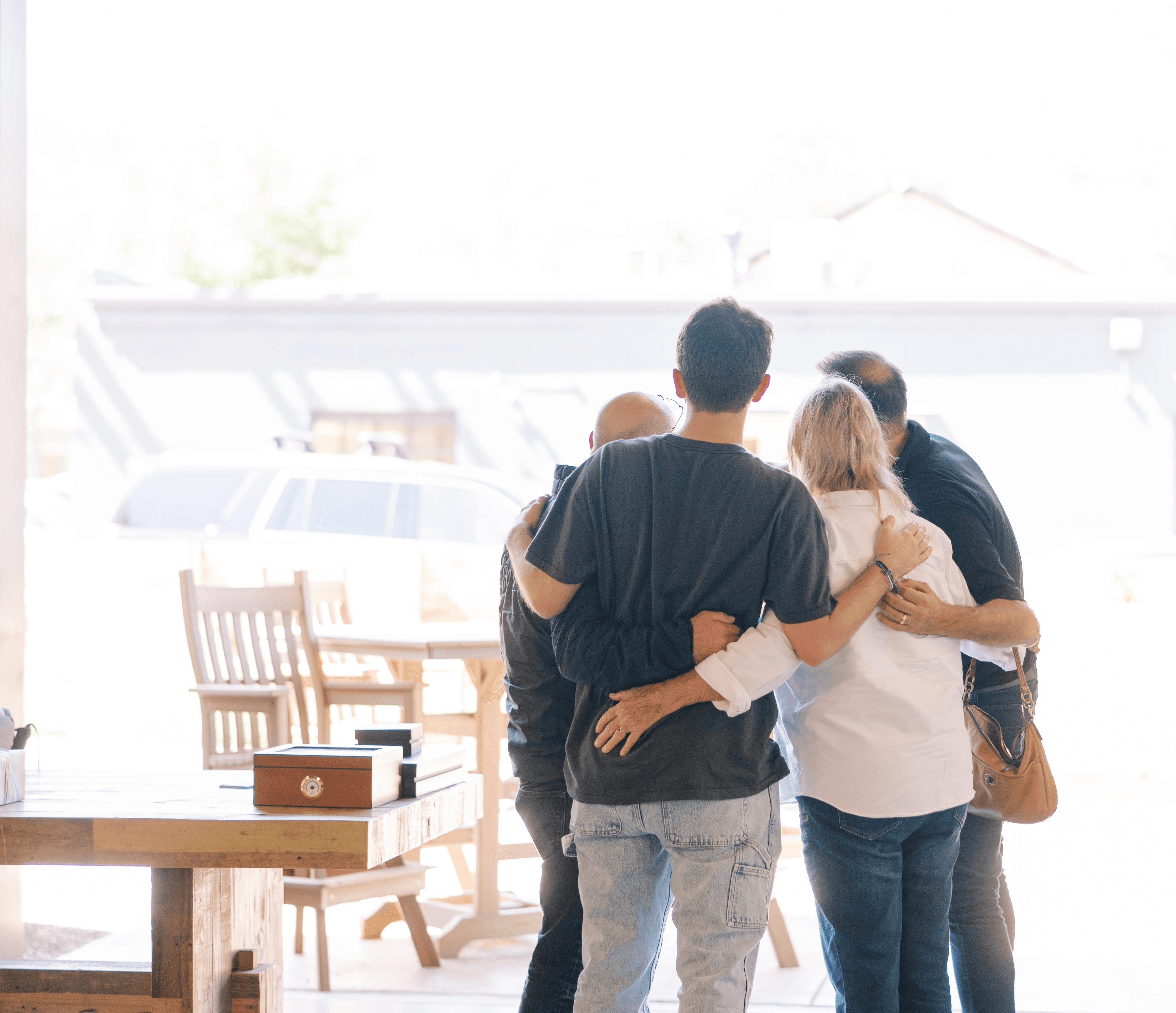 Person at podium with a bible and a phone.