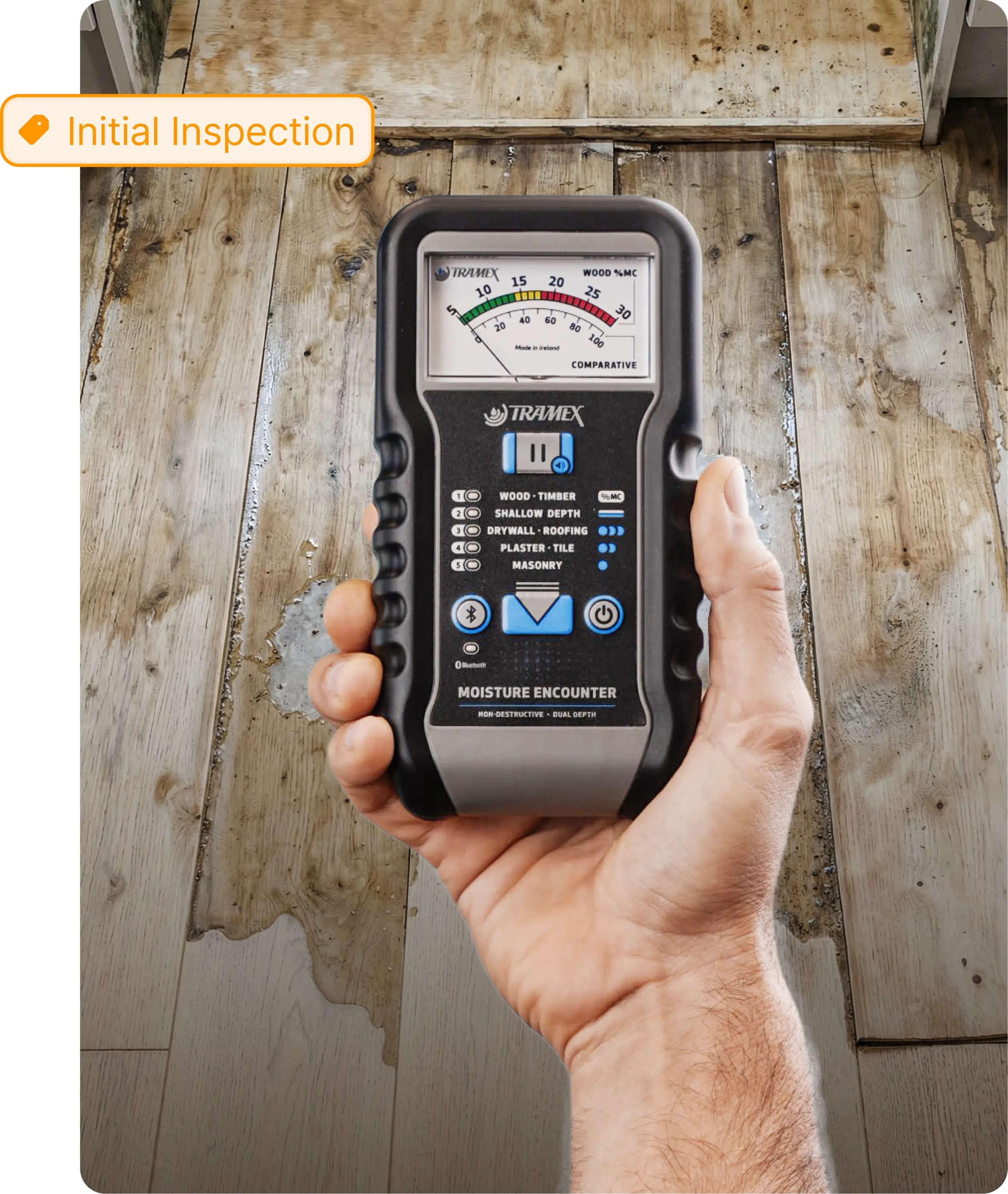 Tramex moisture meter water damage site hardwood floor with initial inspection tag