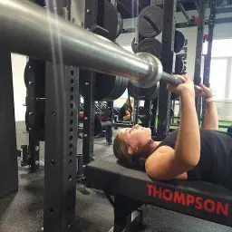 man in black hoodie standing