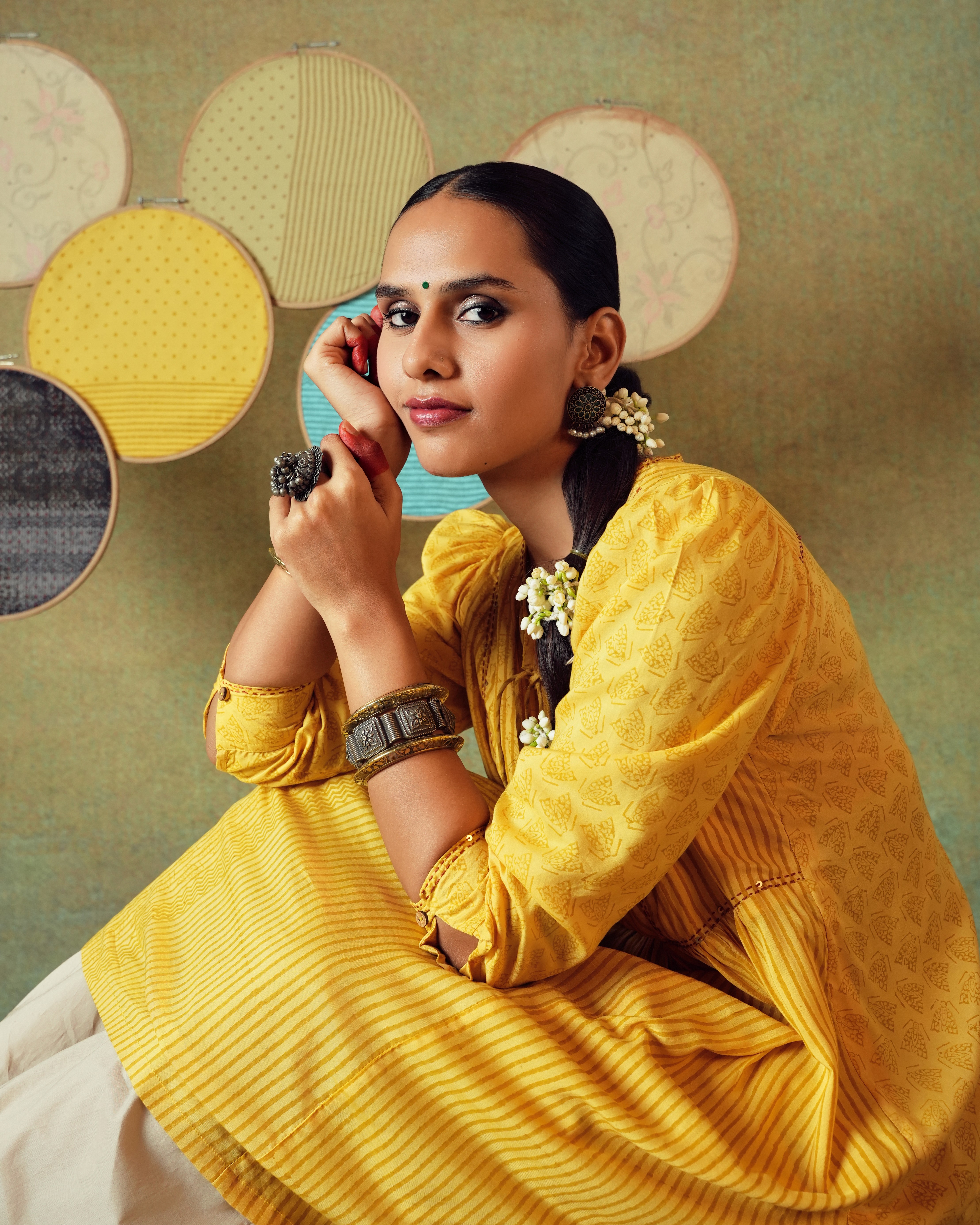 Friends laughing and posing inside a car