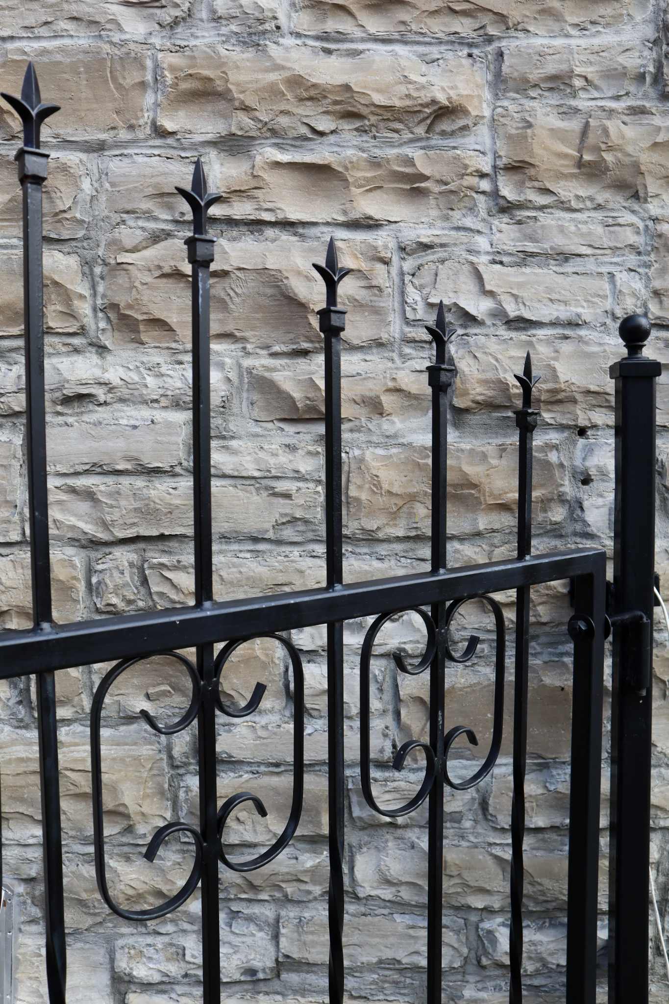 Exterior facade of restored 1890 stone schoolhouse at Ashlar Ottawa wedding venue