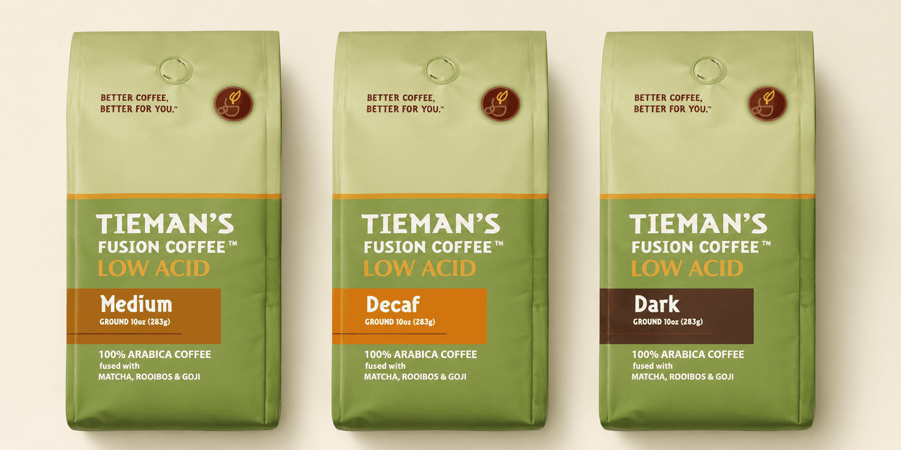 Three Tieman's Fusion Coffee low acid bags—Medium, Decaf, and Dark—displaying premium Arabica coffee with botanical ingredients.