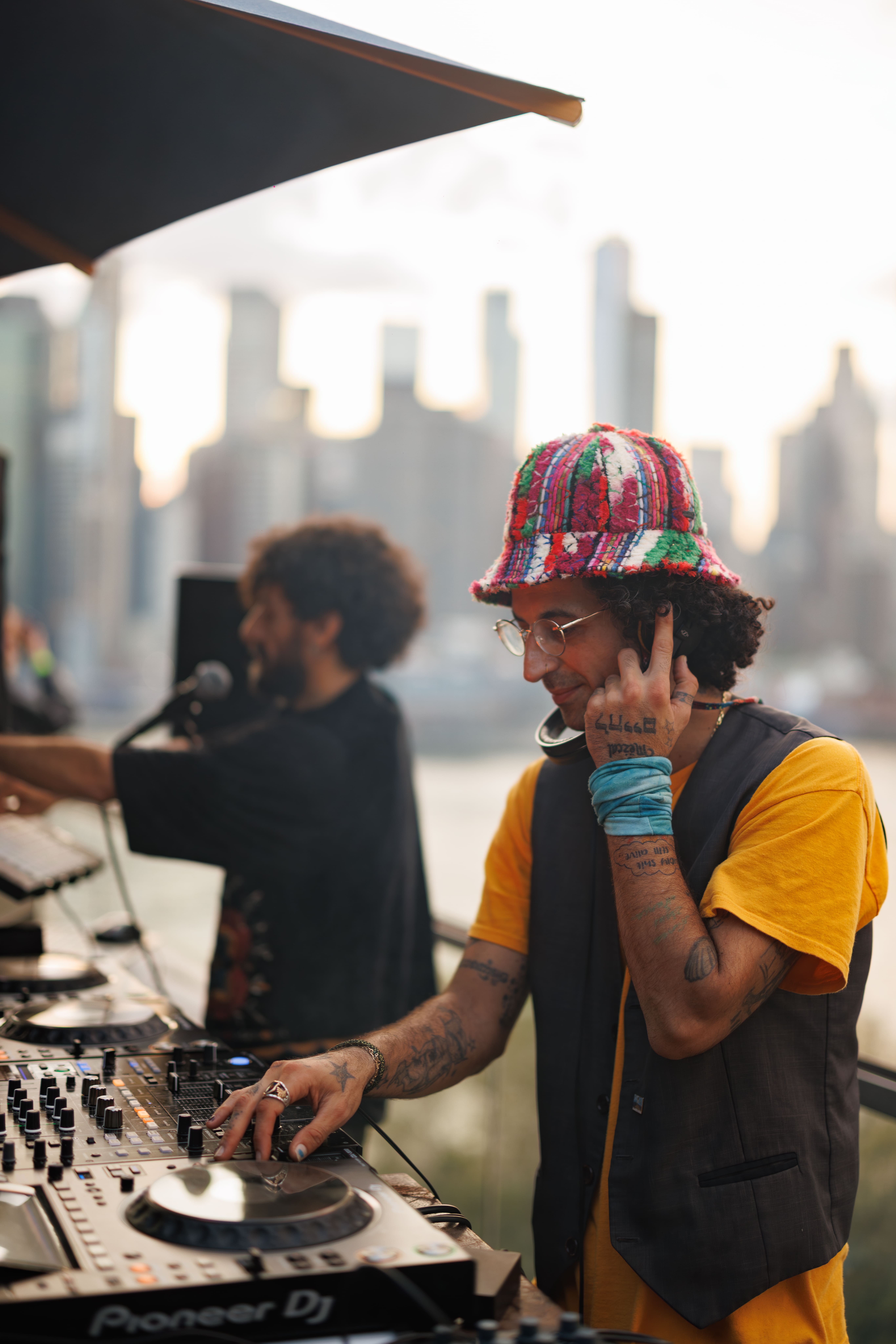 A bottle of daisy perfume with floral accents.