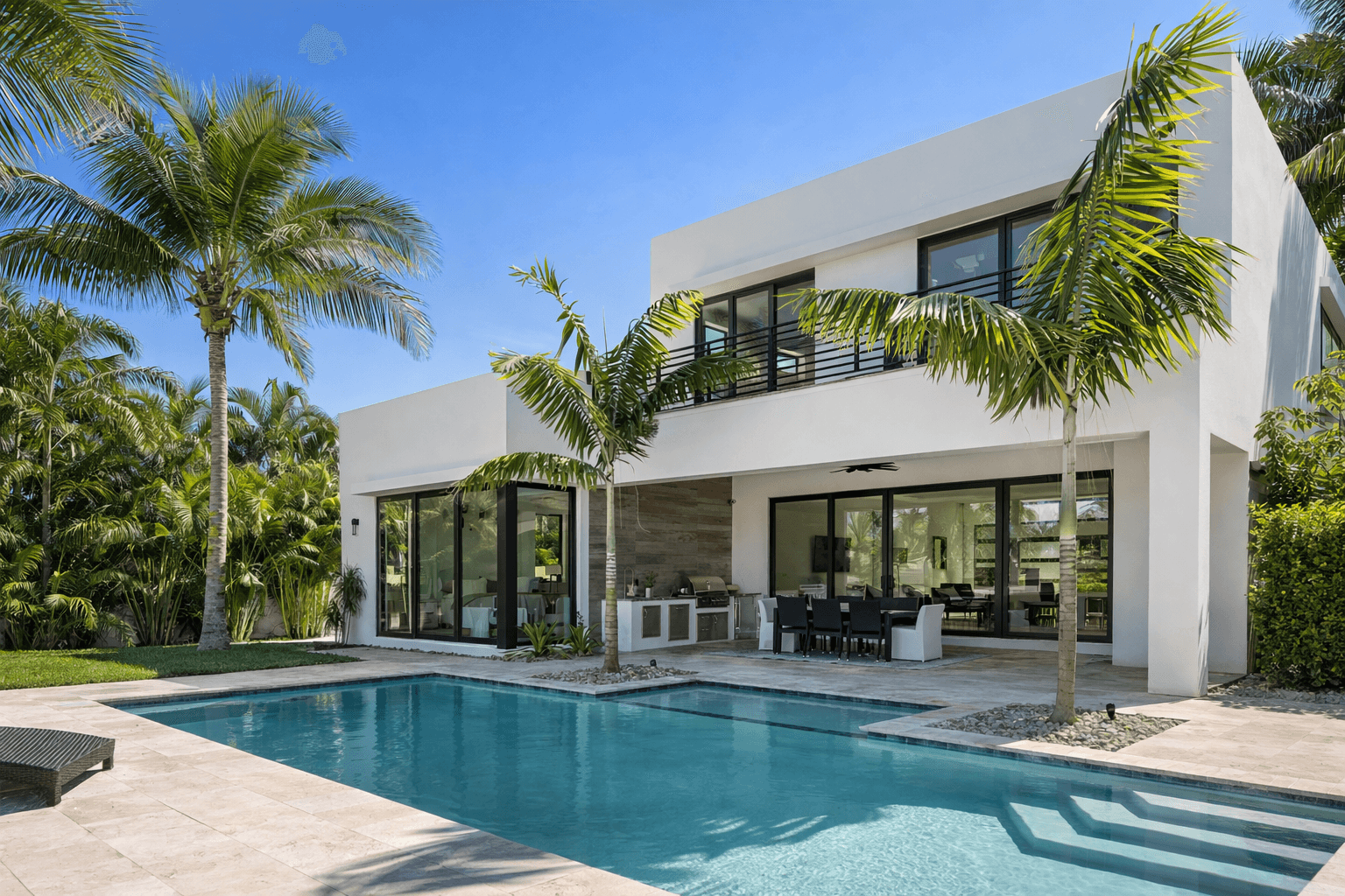kids lying on a glass land and smiling