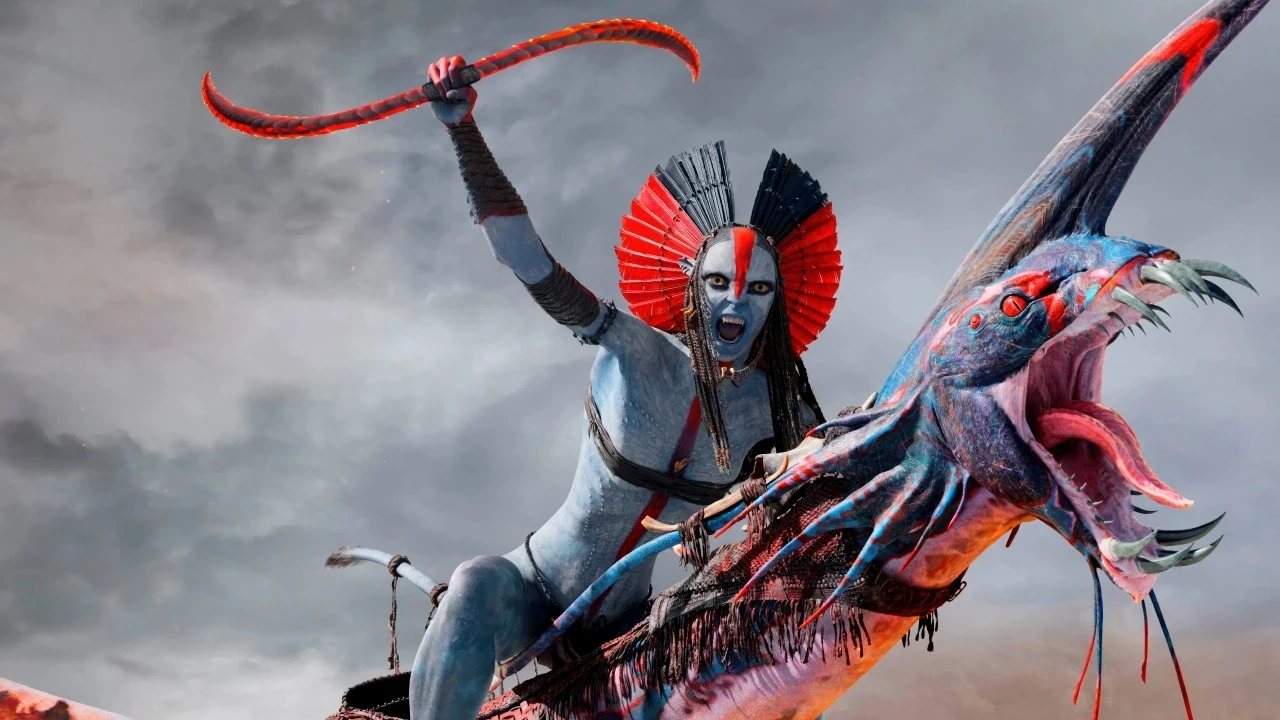 A fierce warrior with tribal face paint and an elaborate headpiece wields a red weapon while riding a fantastical creature with sharp teeth, set against a dramatic cloudy sky.
