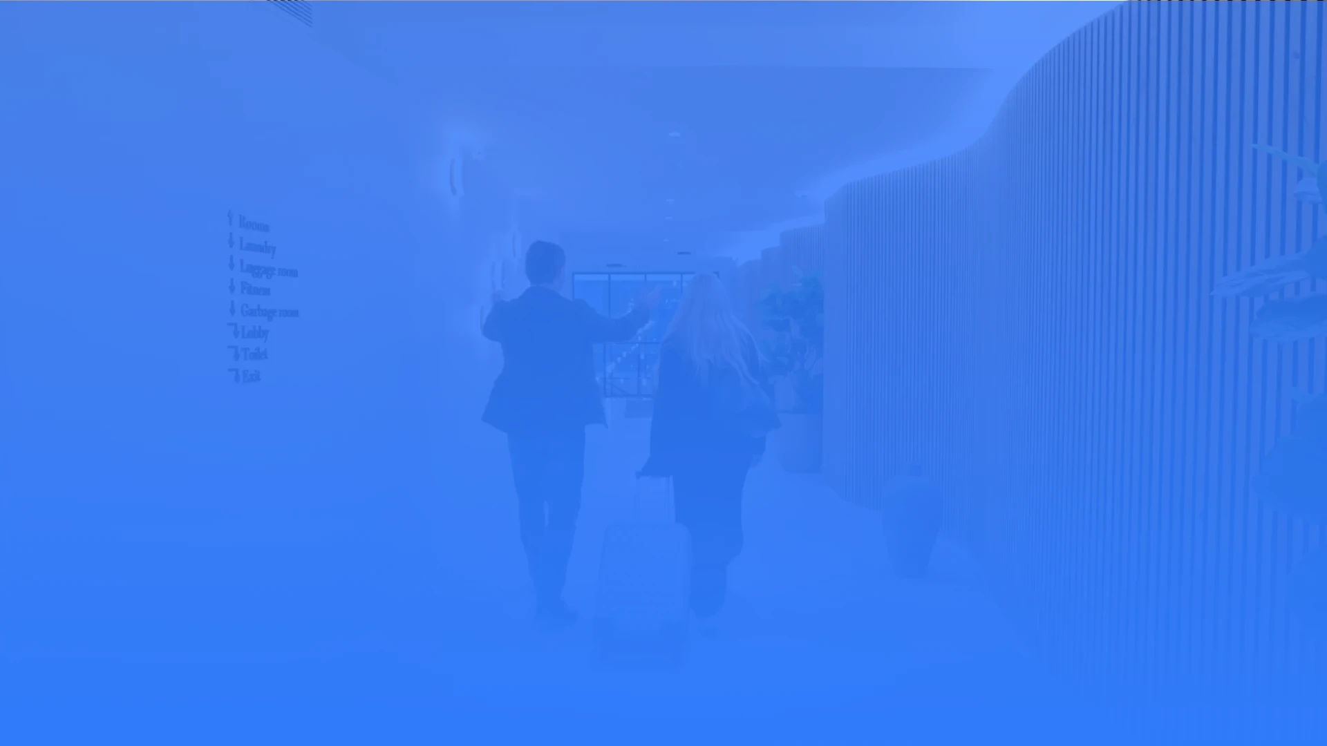 Guest being welcomed into the lobby of a nice hotel