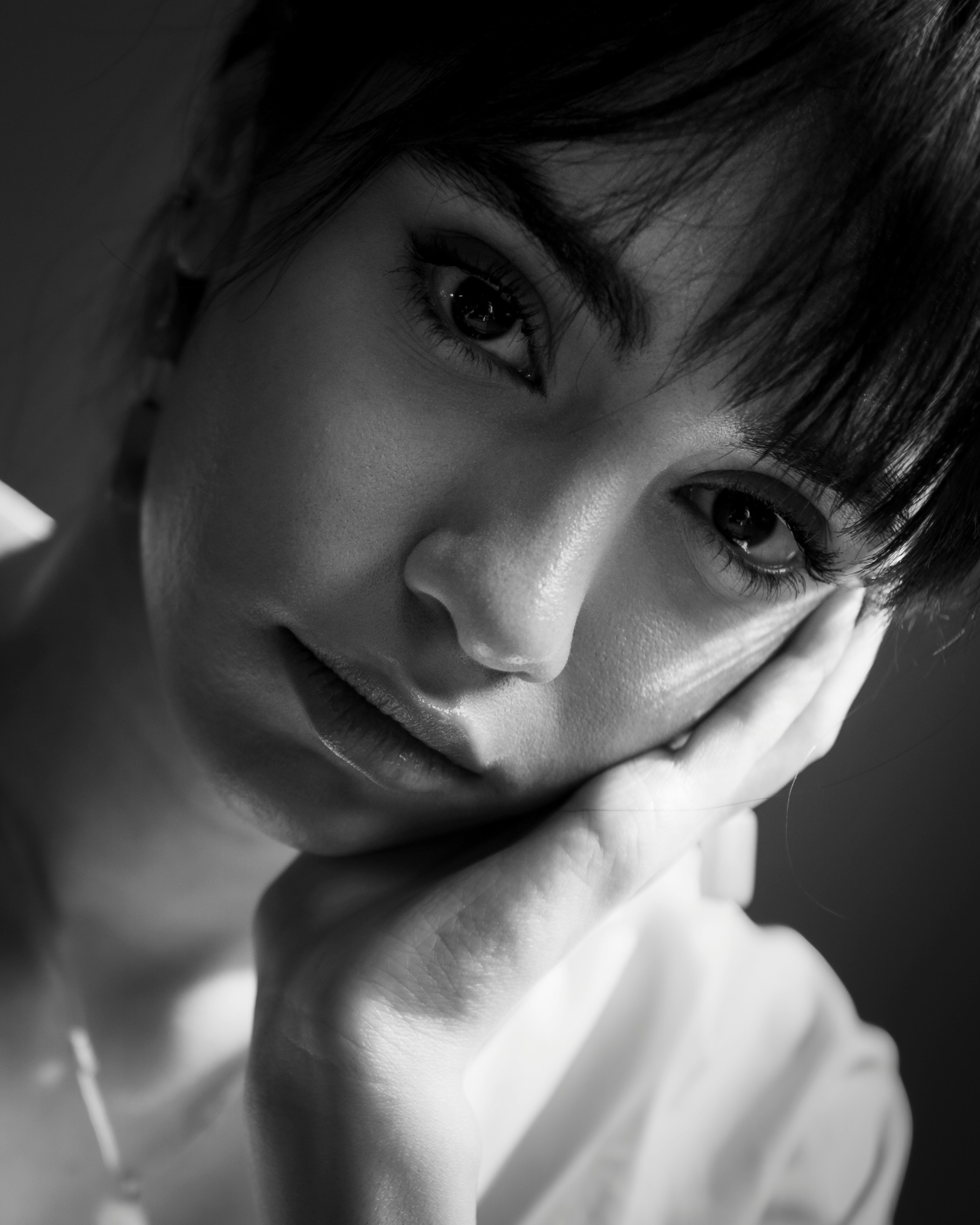 a black and white photo of a woman