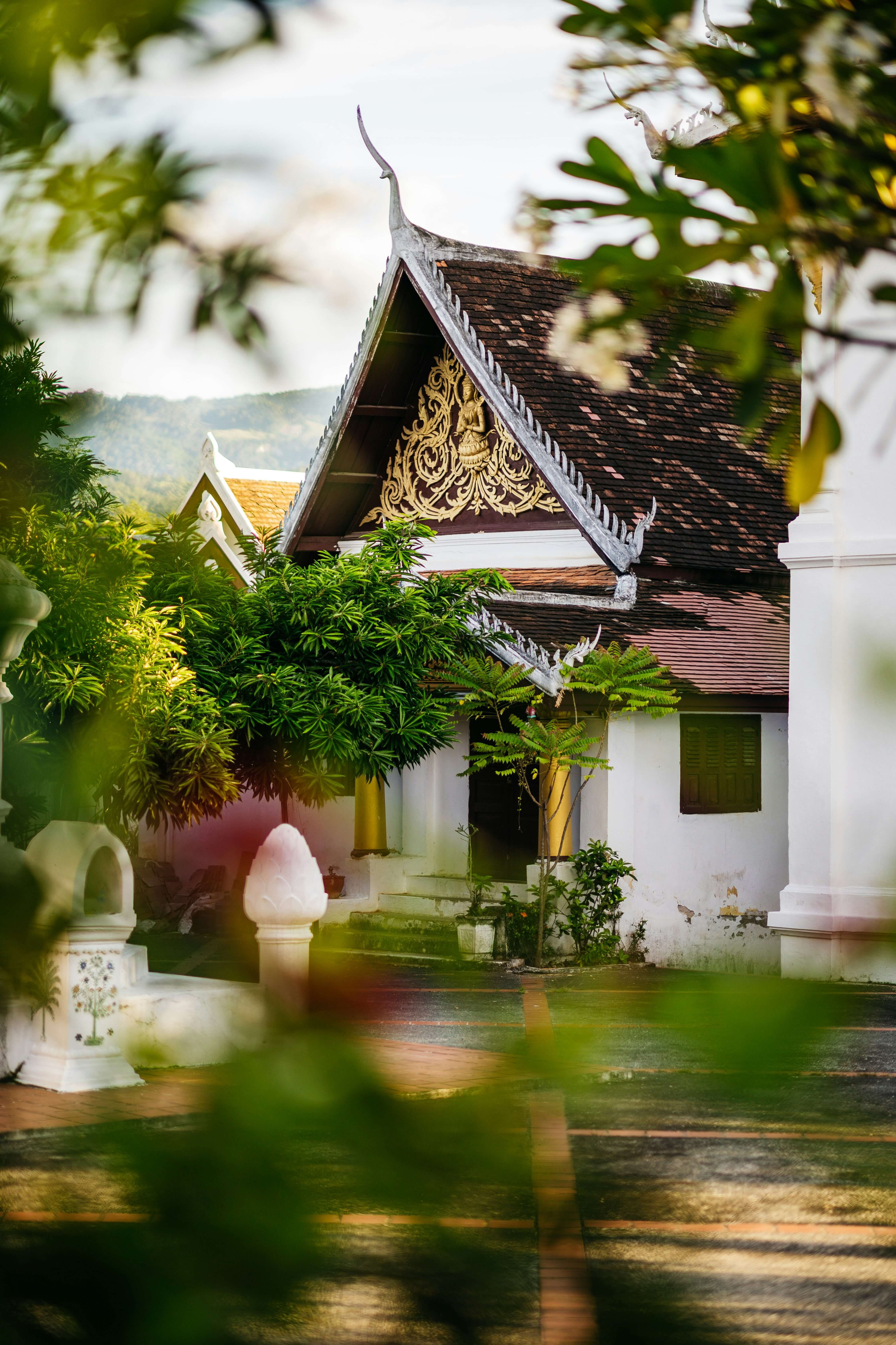 Asian building in a well vegetated area