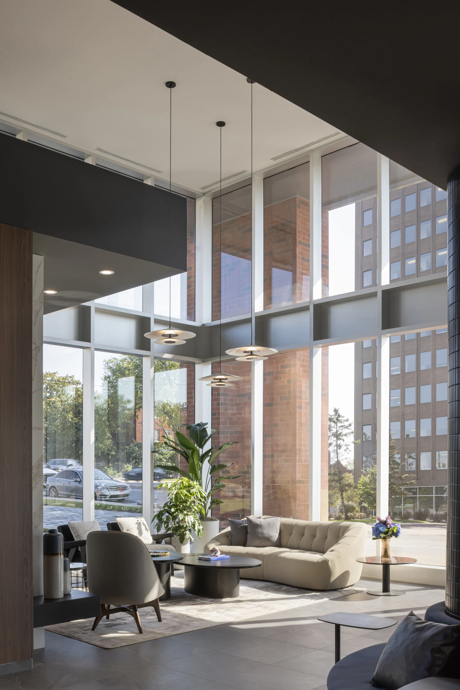 Alternative perspective of Éléonore’s entrance hall, highlighting its open layout, modern textures, and warm lighting.