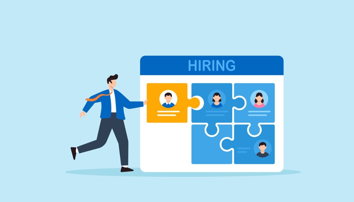 Illustration of a person placing a puzzle piece labeled with a candidate profile into a hiring board.