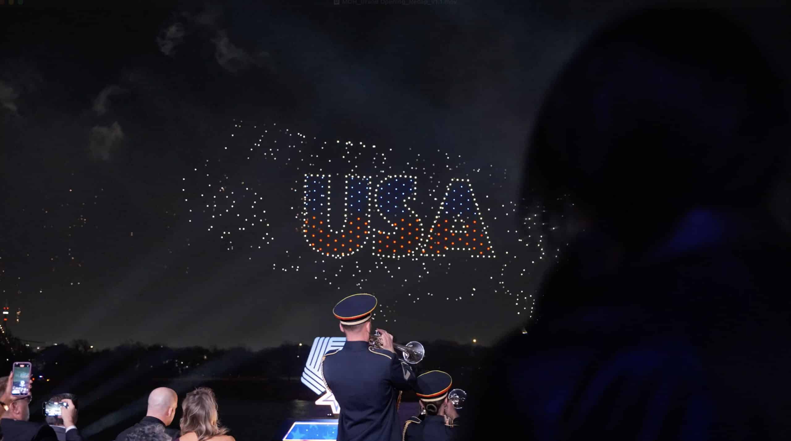 Drones in the sky make up the leters USA at National Medal of Honor Grand Opening