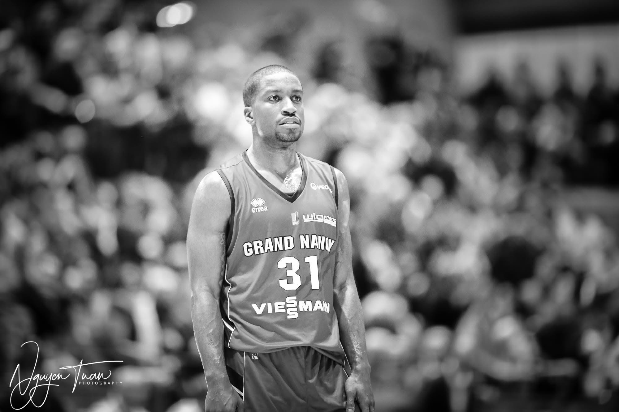 pouring milk in a coffee