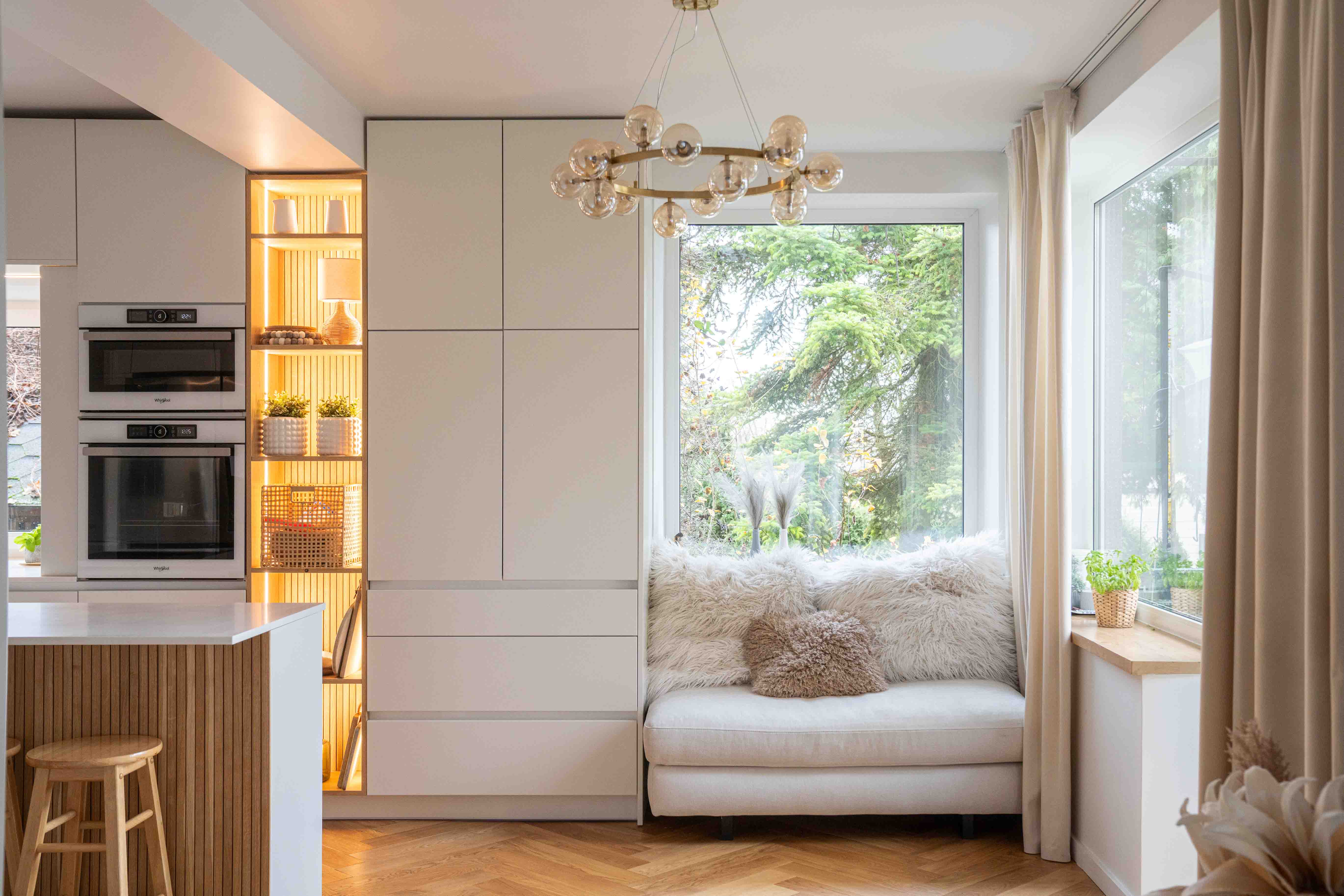 Modern curved staircase with warm ambient lighting