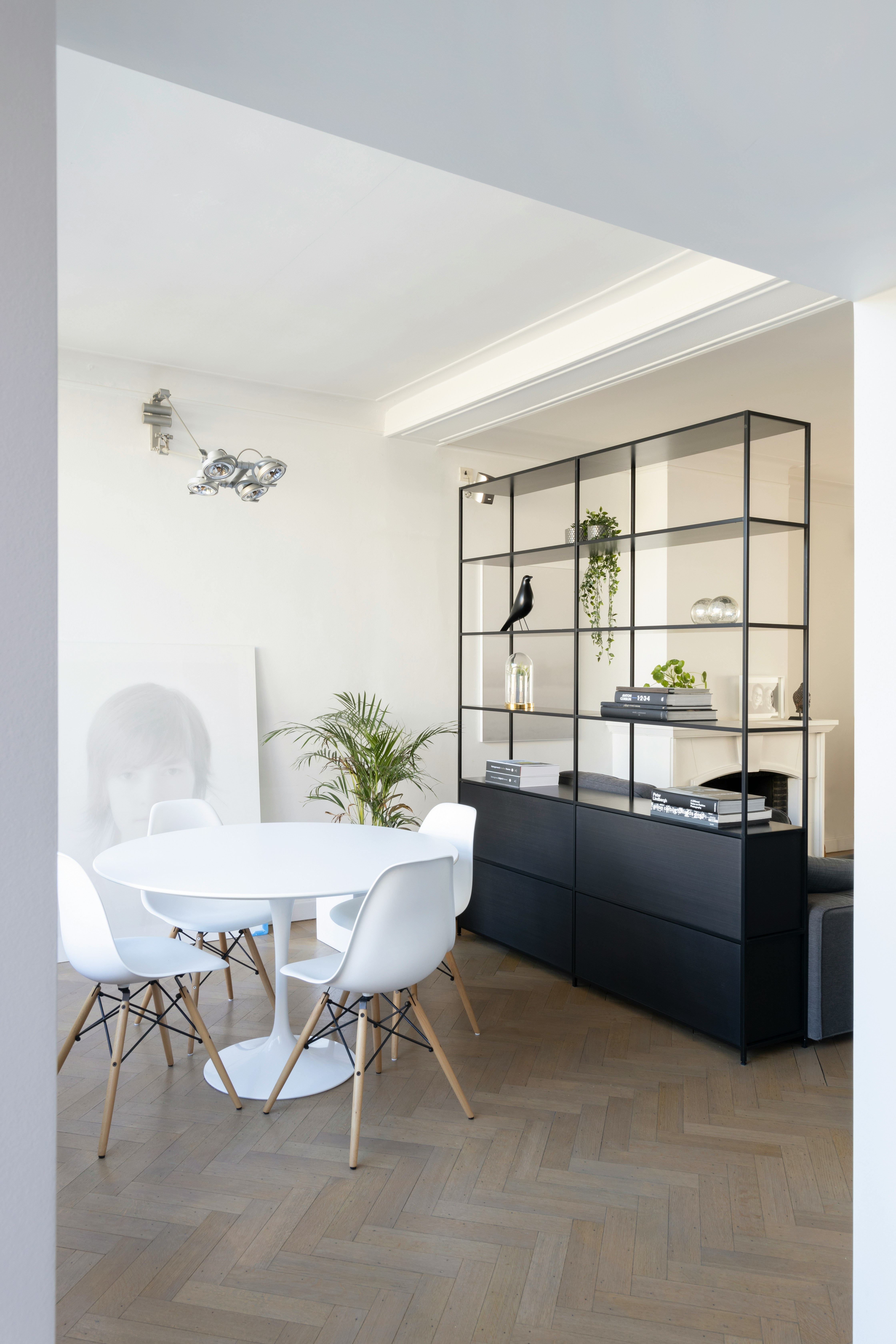 black wooden cabinet beside white table
