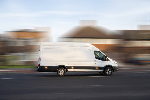 LWB van driving down the road background is blurred
