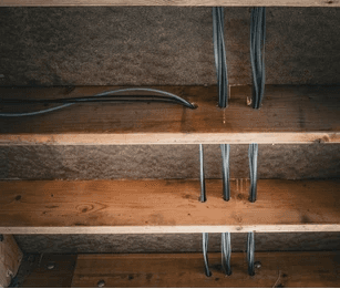 An electrician rewiring a property.