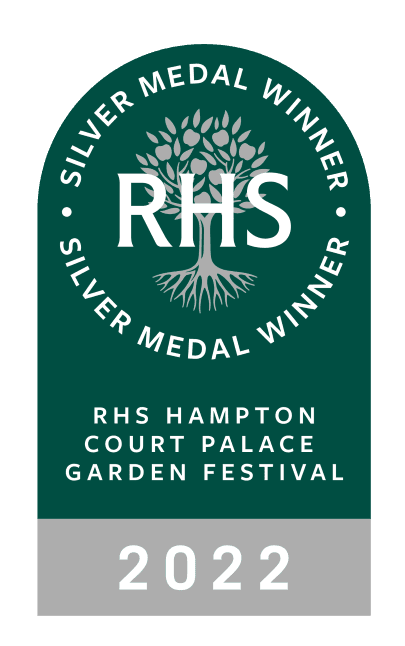 Green badge with a tree logo, text "RHS", and "2022" indicating a gardening competition or award.